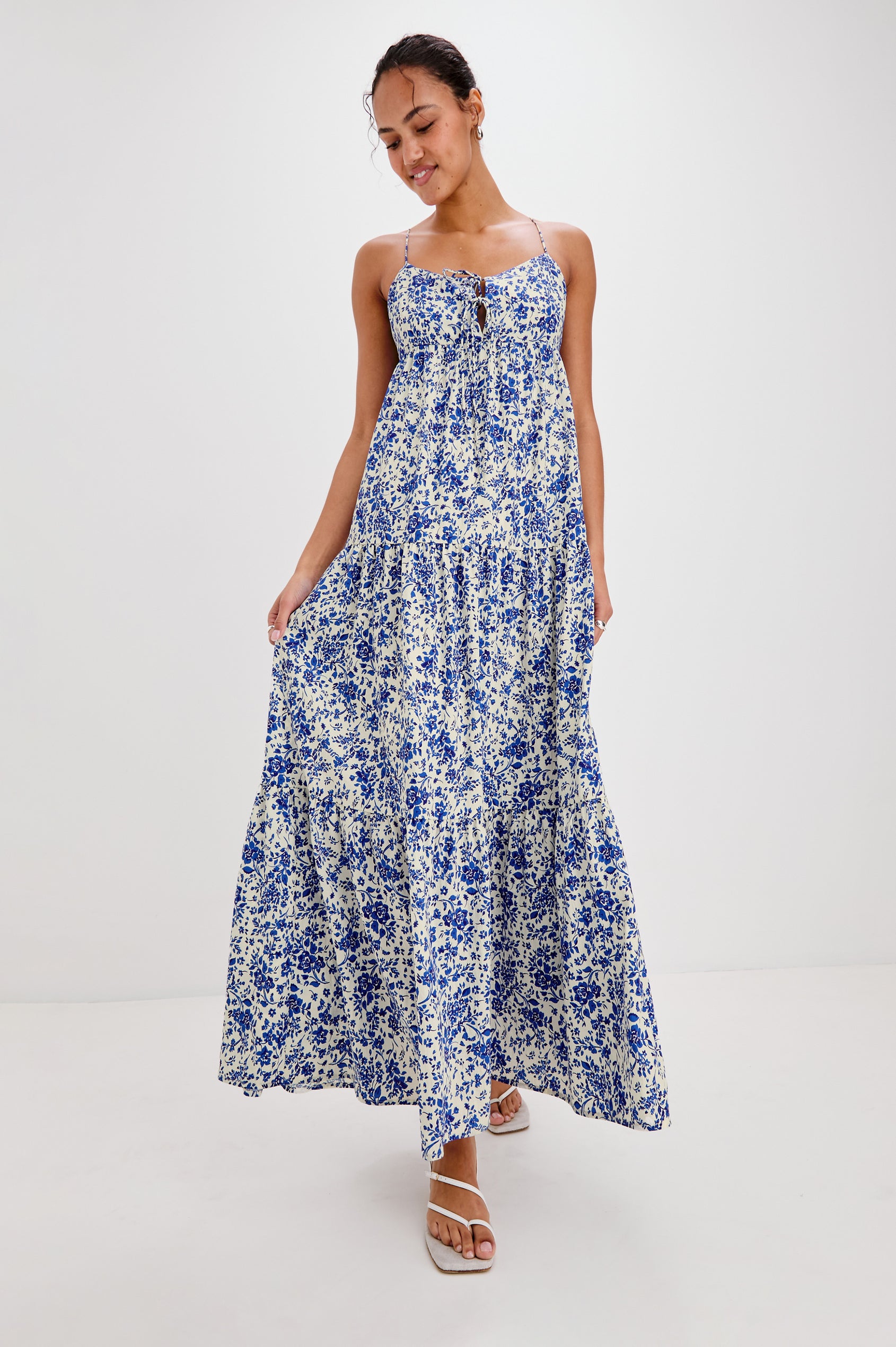 Mica Midi Tank Dress with Spaghetti Straps, a Keyhole at Center Front, Ties and a Tiered Skirt in Blue Marguerite Colorway. Front View Shown on Model.