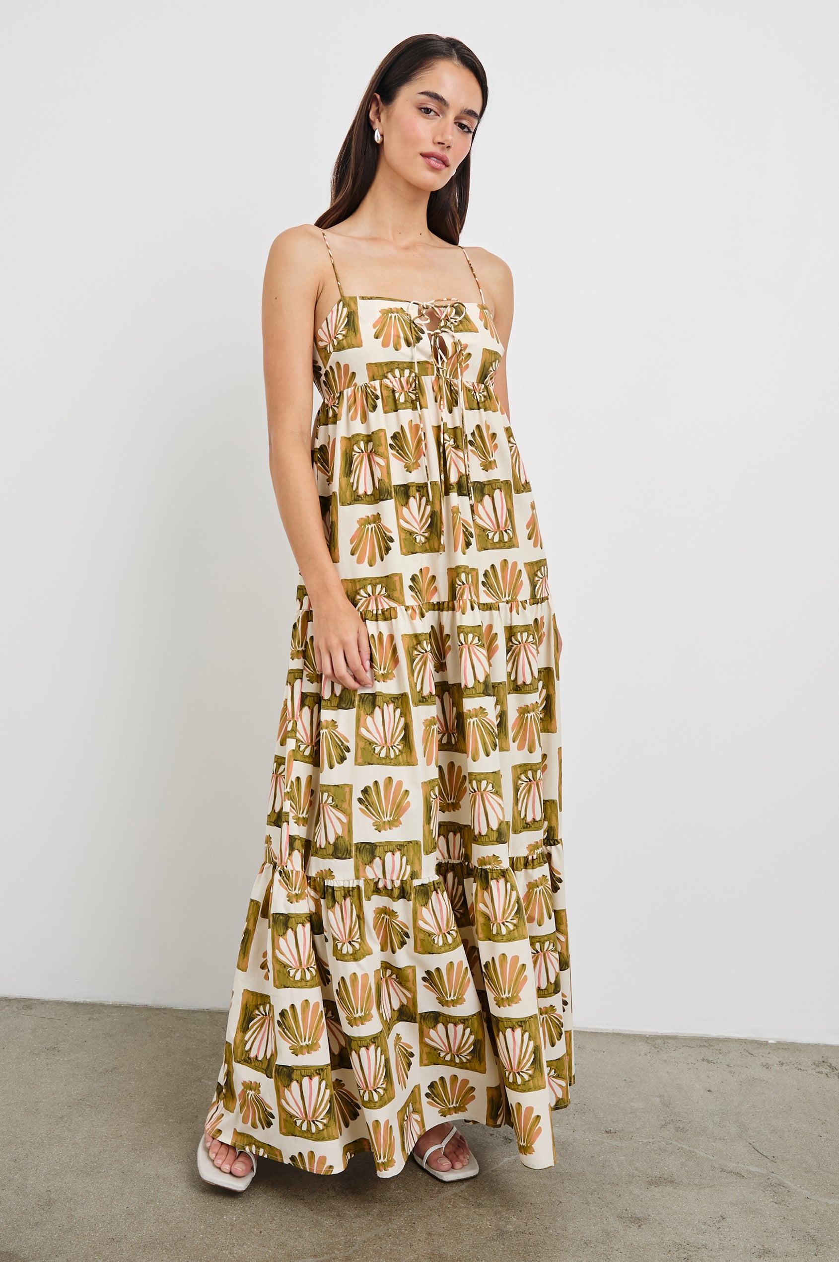 Mica Midi Tank Dress with and Empire Waist, Spaghetti Straps, a Keyhole at Center Front, Ties and a Tiered Skirt in Checkered Shells Colorway. Front View Shown on Model.