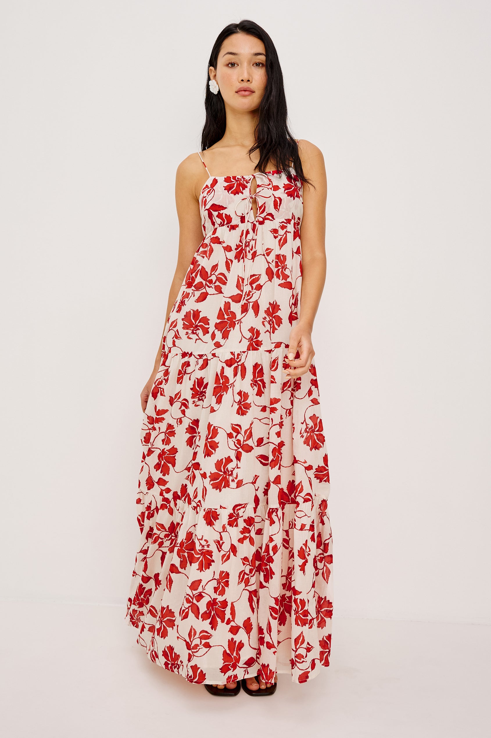 Mica Maxi Dress in Cotton With Adjustable Shoulder Straps Center-Bust Cutout With Adjustable Ties Smocked Back and Fully Lined Tiered Skirt in Red Jasmine Colorway - Full Body Front View Featured on Model