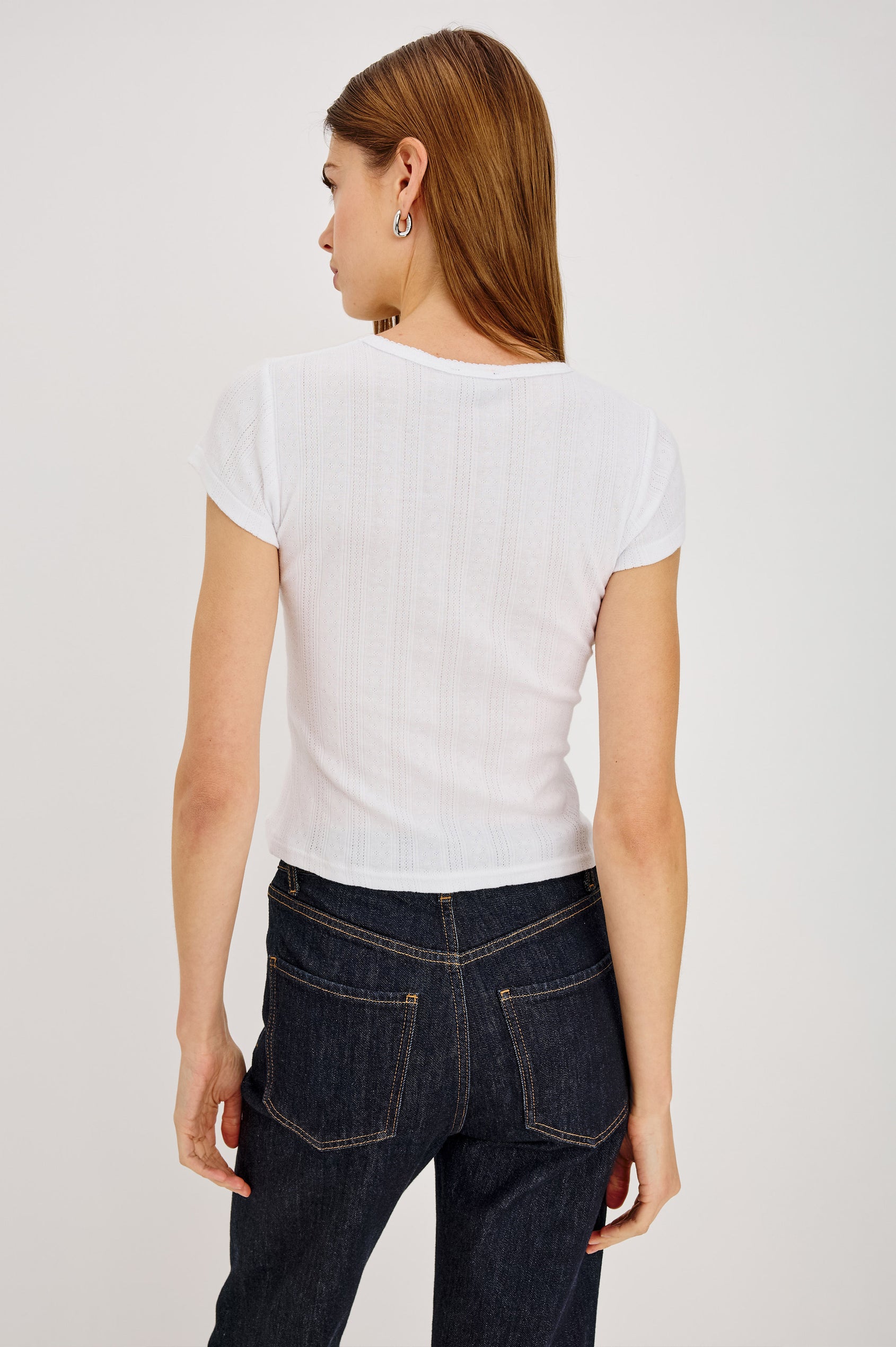 Mickey Top in Pointelle Cotton With Cropped Fit, Crew Neckline, and Cuffed Cap Sleeves in White Pointelle Colorway - Upper Body Back View Featured on Model