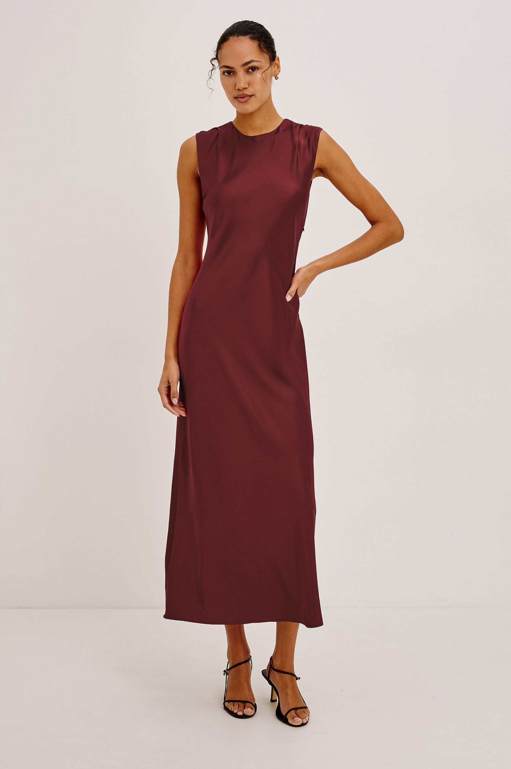 Mira Maxi Dress Bias Cut in Satin-Back Crepe With Crew Neckline, Pleated Shoulders, Side Zipper, and Keyhole Back With Button-Loop Closure in Crimson Colorway - Full Body Front View Featured on Model