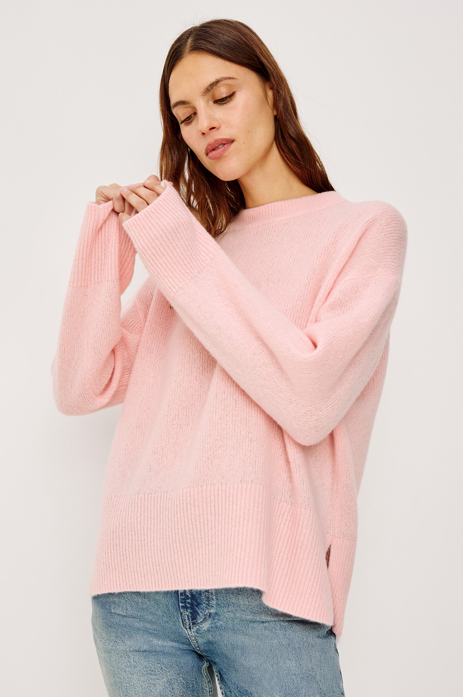Miranda Sweater in Cashmere-Silk Blend With Crew Neckline, Ribbed Trim, Dropped Shoulders, Loose Relaxed Fit, and Long Sleeves in Carnation Colorway - Upper Body Front View Featured on Model