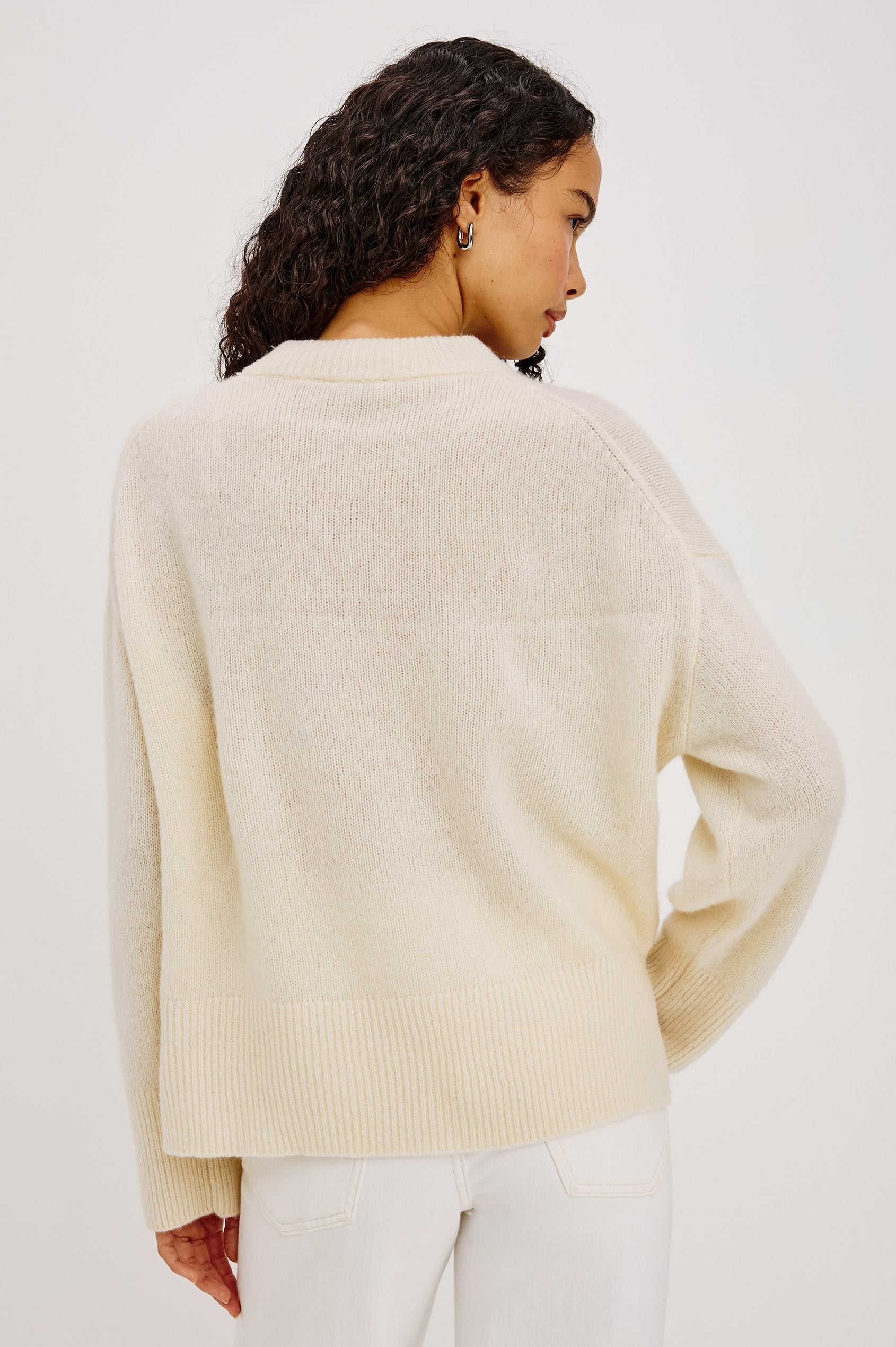 Miranda Sweater in Cashmere-Silk Blend With Relaxed Boxy Fit, Mock Neck, Drop Shoulders, and Side Slits at Hem in Ivory Colorway - Upper Body Back View Featured on Model