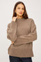 Miranda Long-Sleeve Sweater with a Mock Neck, Side Slits, and Ribbed Trim in Oatmeal Colorway - Front View Featured on Model