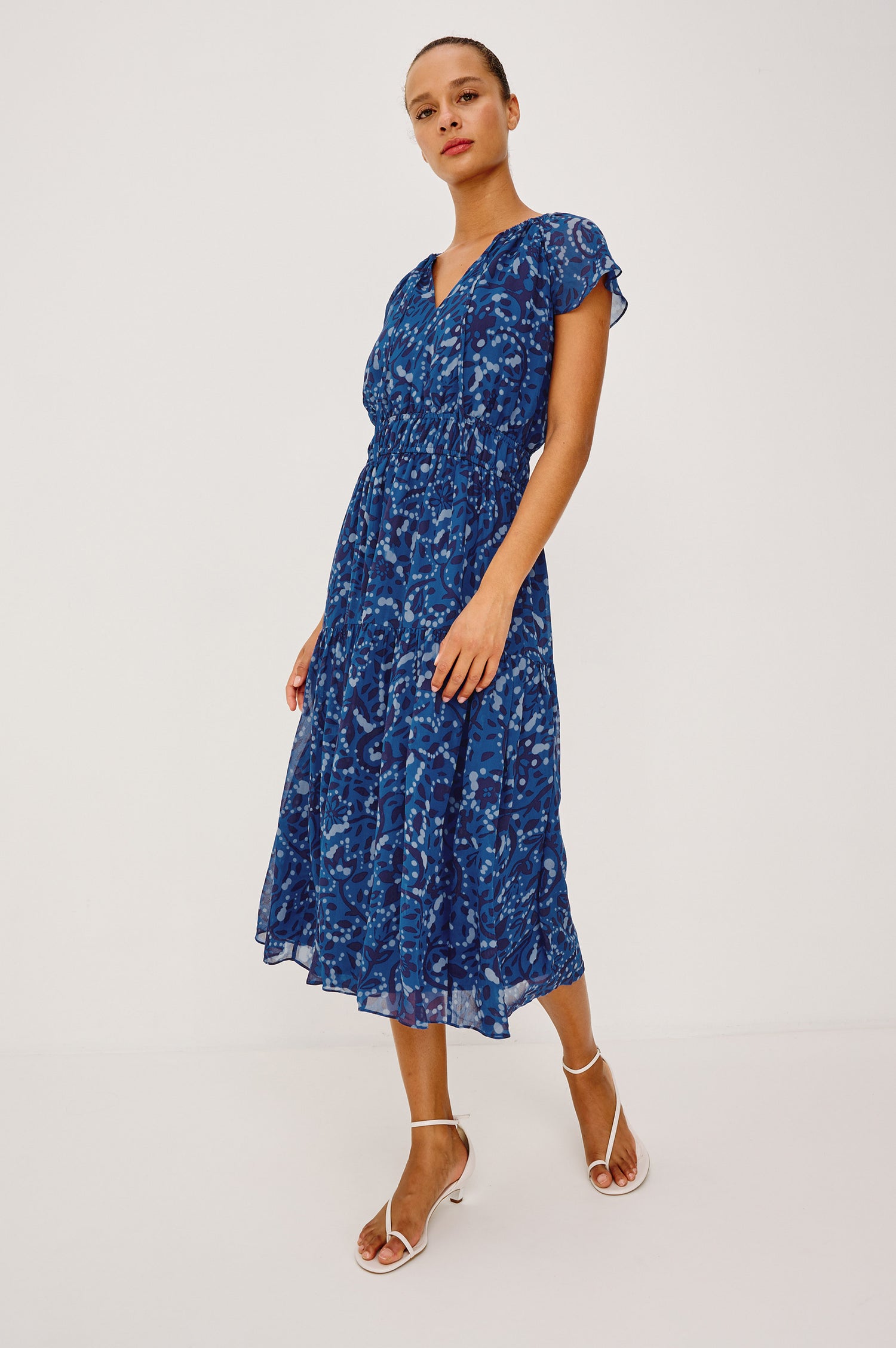 Mirielle Maxi Dress in Chiffon With V-Neckline, Elastic Waist, Center Front Ties, Raglan Short Sleeves, Single Tier Skirt and is Fully Lined - Full Body Front View Featured on Model