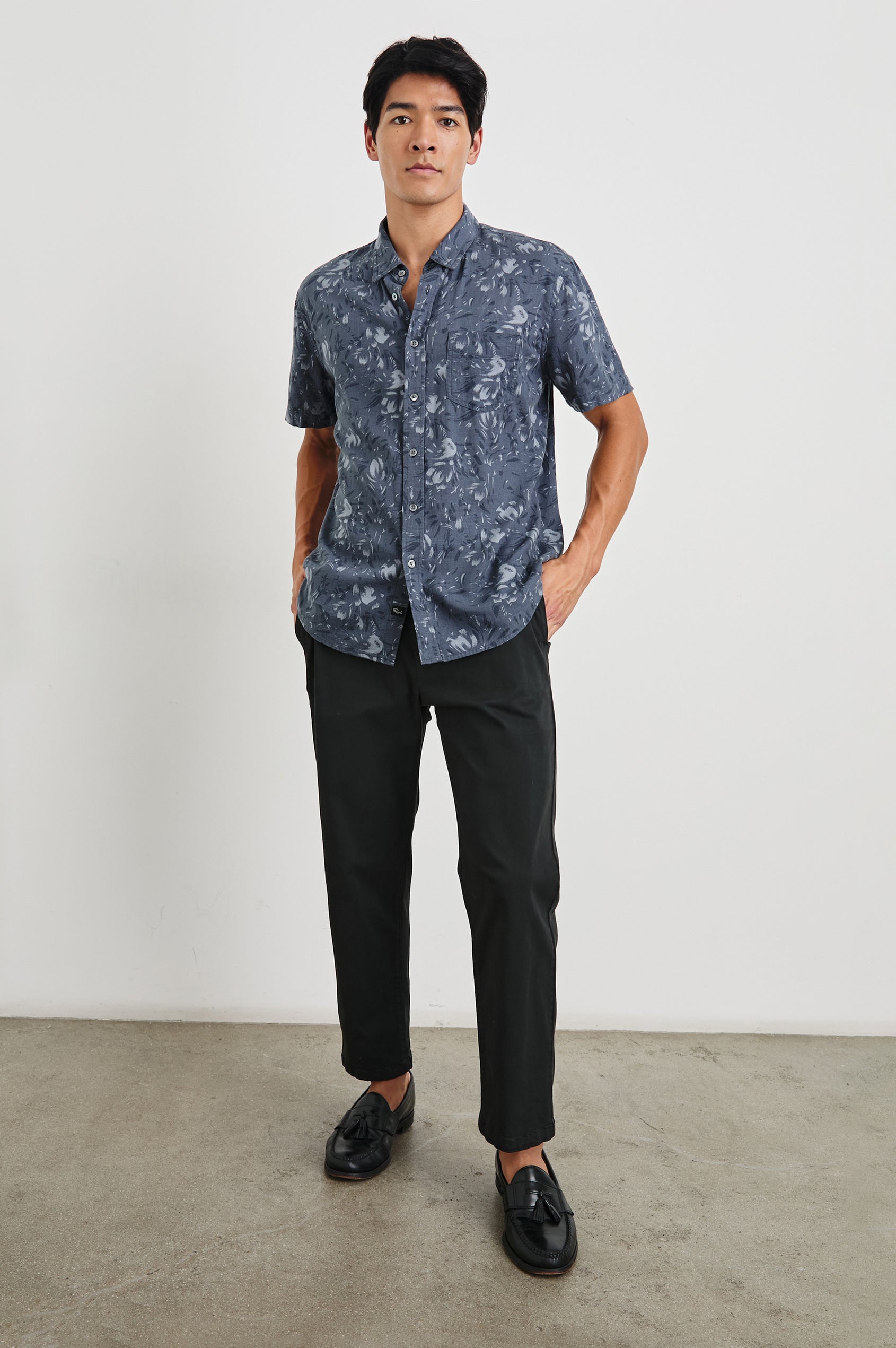 Monaco Short-Sleeve Button Up with a Chest Patch Pocket in Navy Floral Brush Colorway, Abstract Flowers in Blues on Navy - Front Full Body View Featured on Model