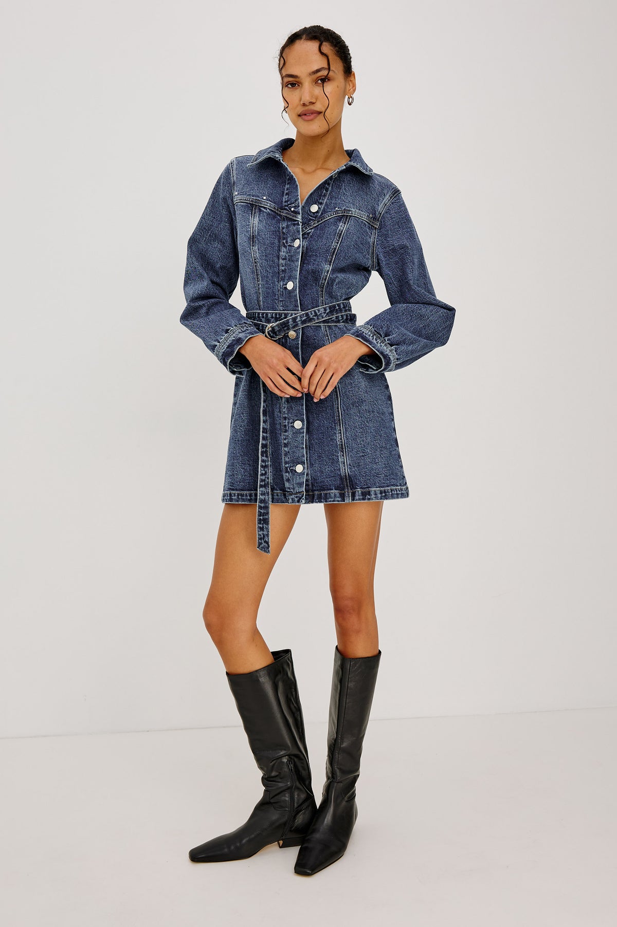 Montant Mini Dress in Comfort-Stretch Denim With Studded Front Yoke, Button-Front, Long Sleeves, and Double Belt in Blue Bonnet Colorway - Full Body Front View Featured on Model