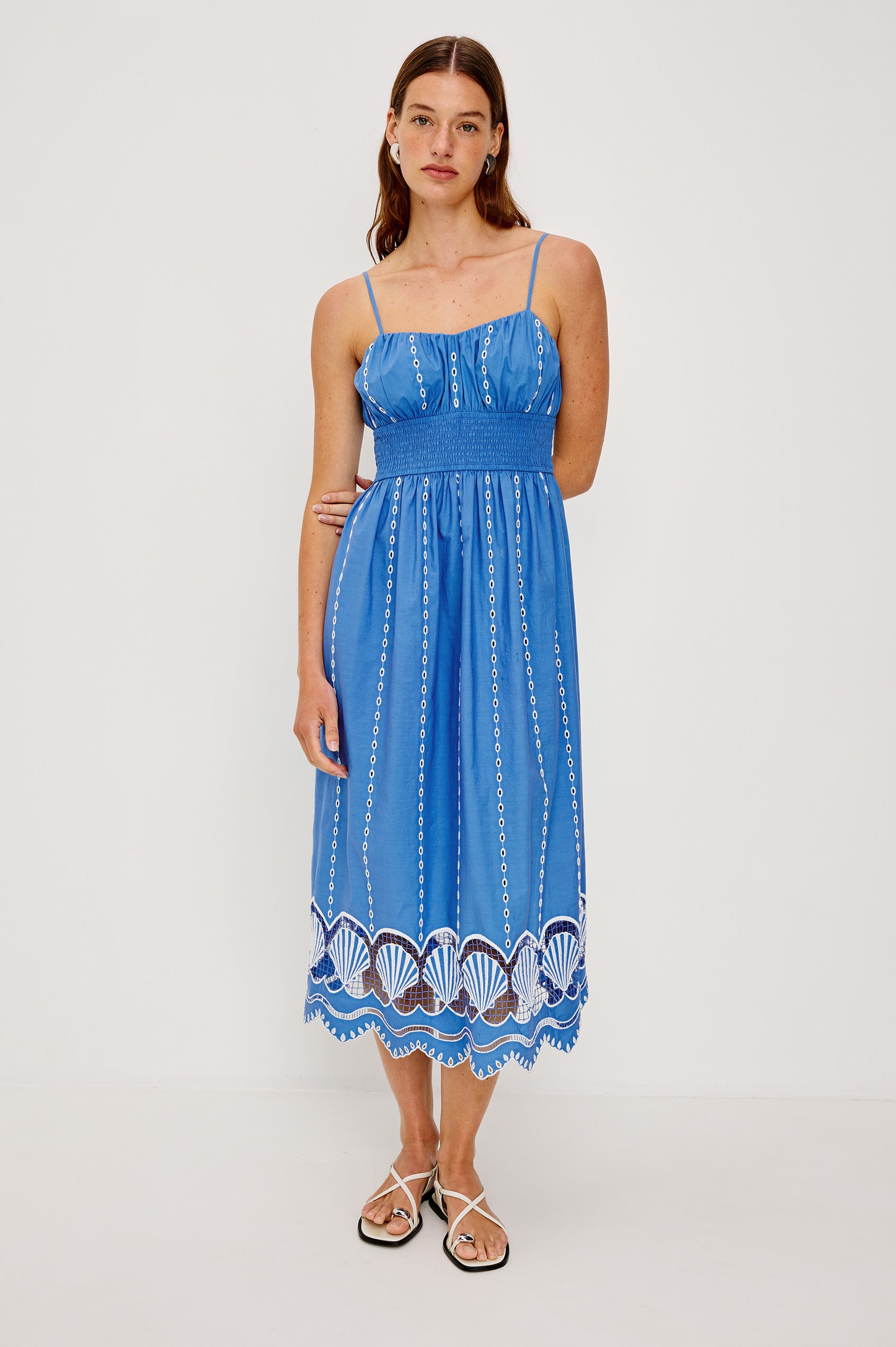 Murano Midi Tank Dress with Spaghetti Straps, Gathered Elastic Waistband, Sea Shell Embroidery and Scalloped Hem in French Blue Colorway. Full Body Front View Shown on Model.
