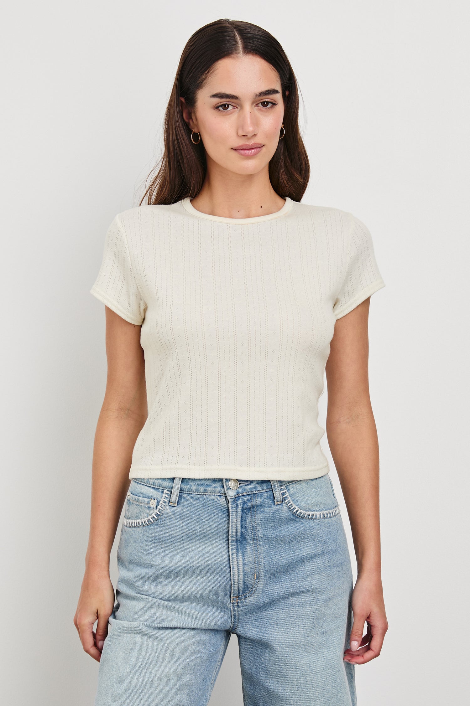 Muse crewneck short sleeve shirt with pointelle ribbed fabric in Ivory colorway - front view on model