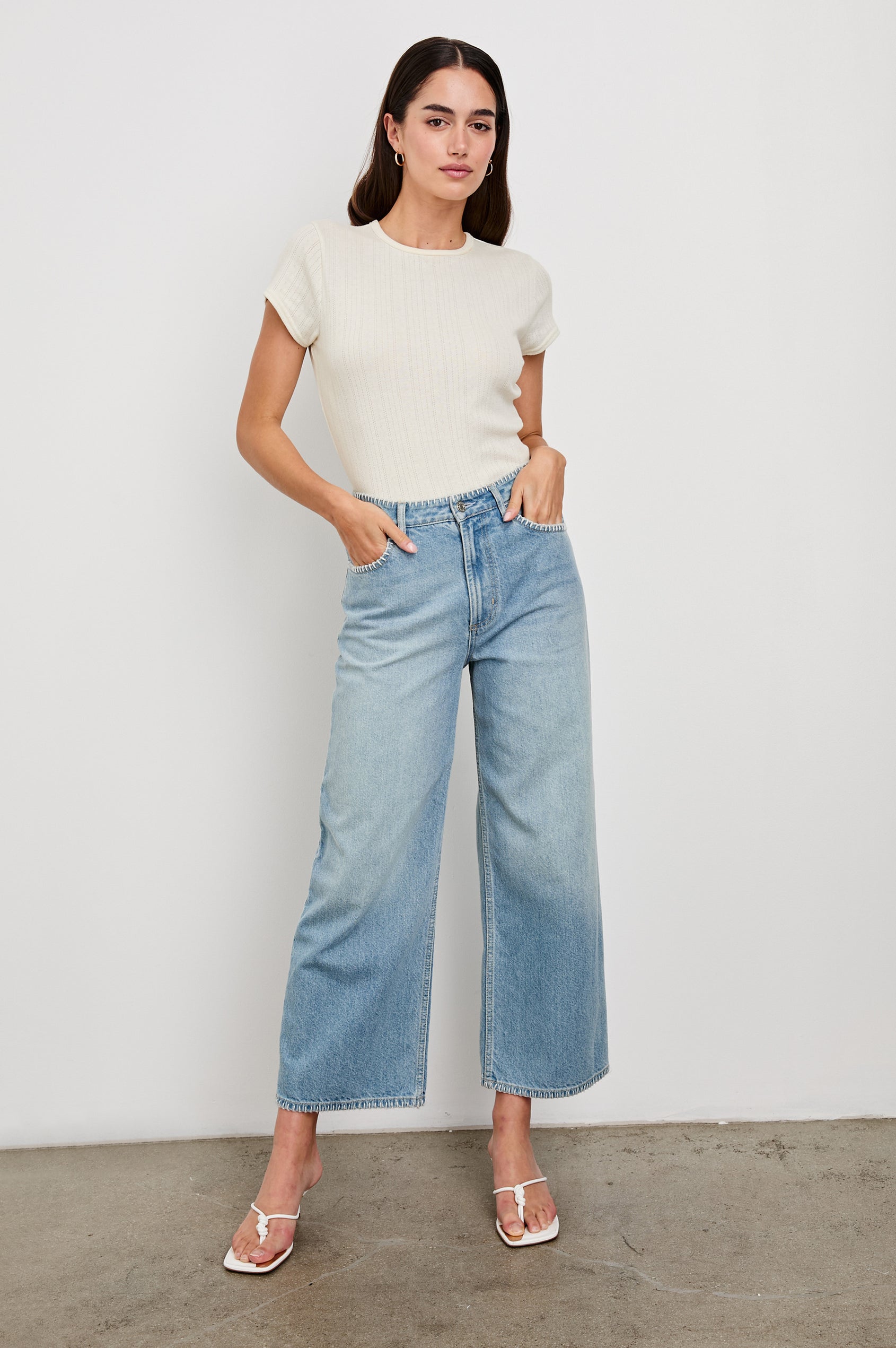 Muse crewneck short sleeve shirt with pointelle ribbed fabric in Ivory colorway - full body front view on model