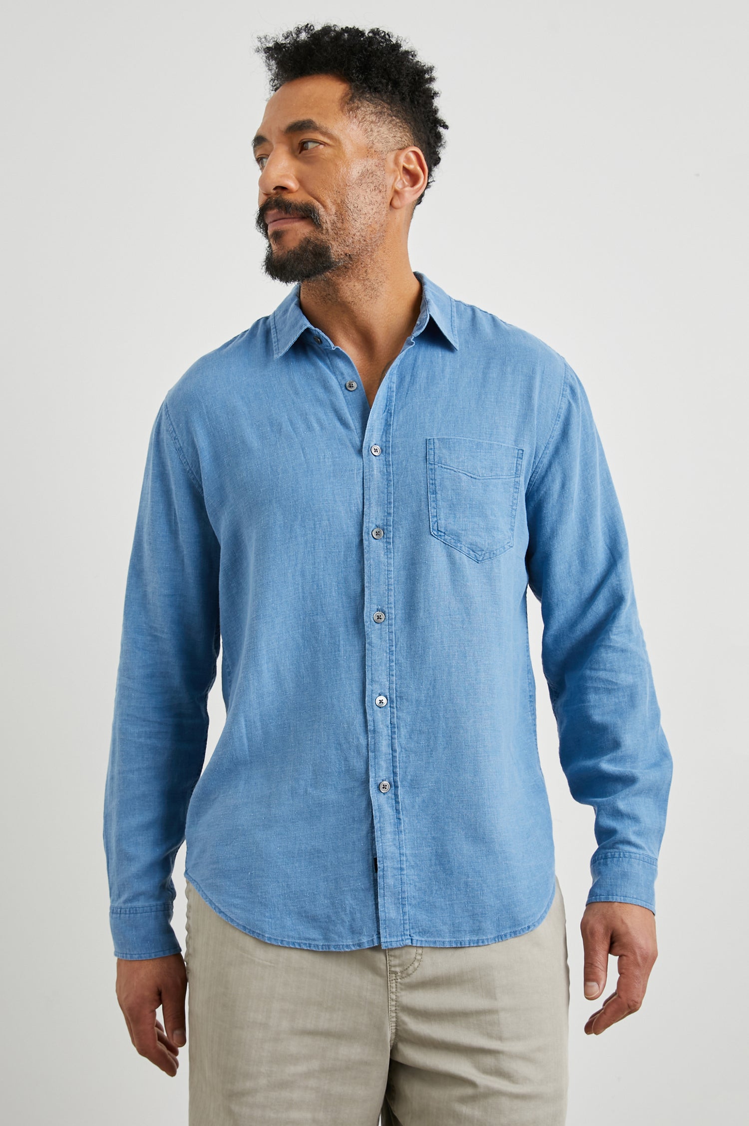 Mykonos Long-Sleeve Button Up with a Patch Pocket in Celsius Colorway, a blue - Front View Featured on Model
