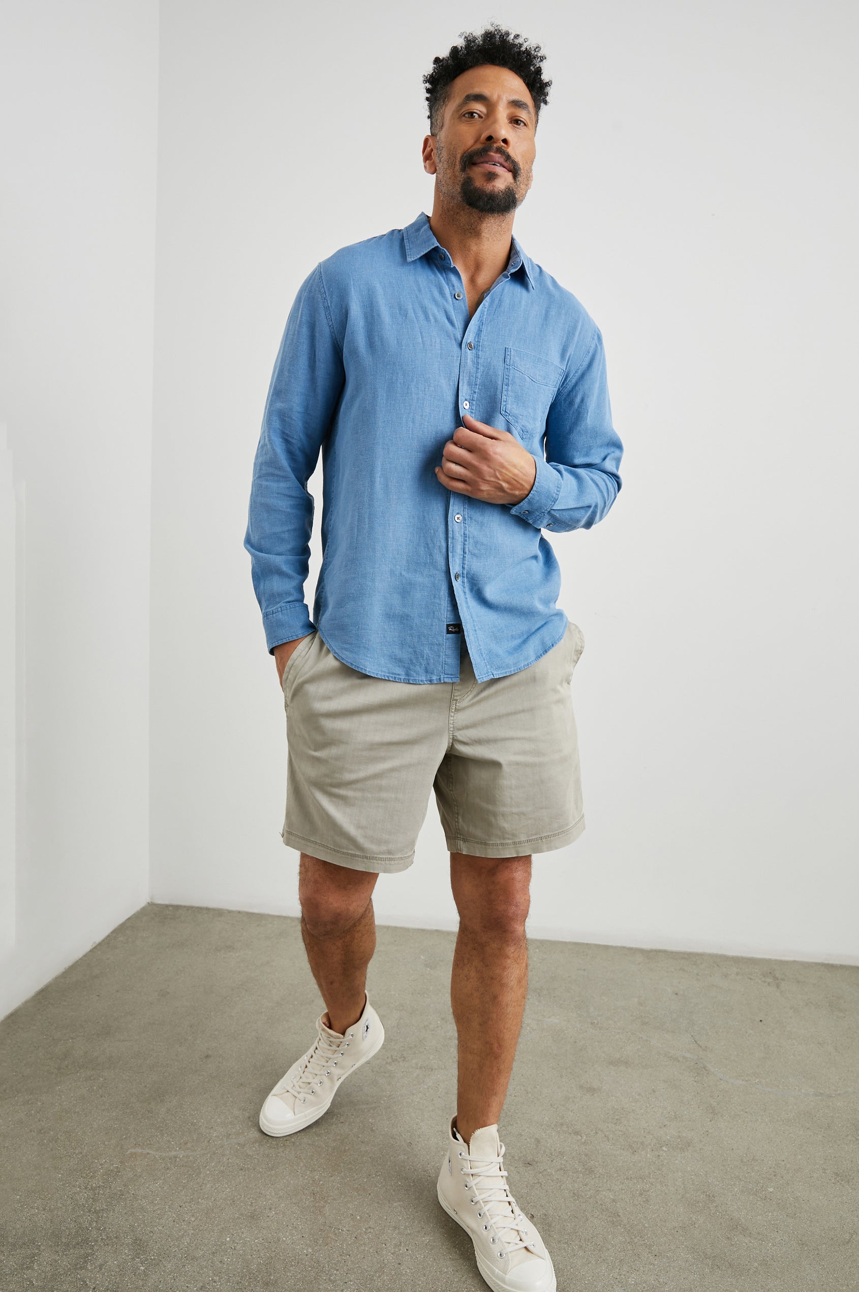Mykonos Long-Sleeve Button Up with a Patch Pocket in Celsius Colorway, a blue - Front Full Body View Featured on Model