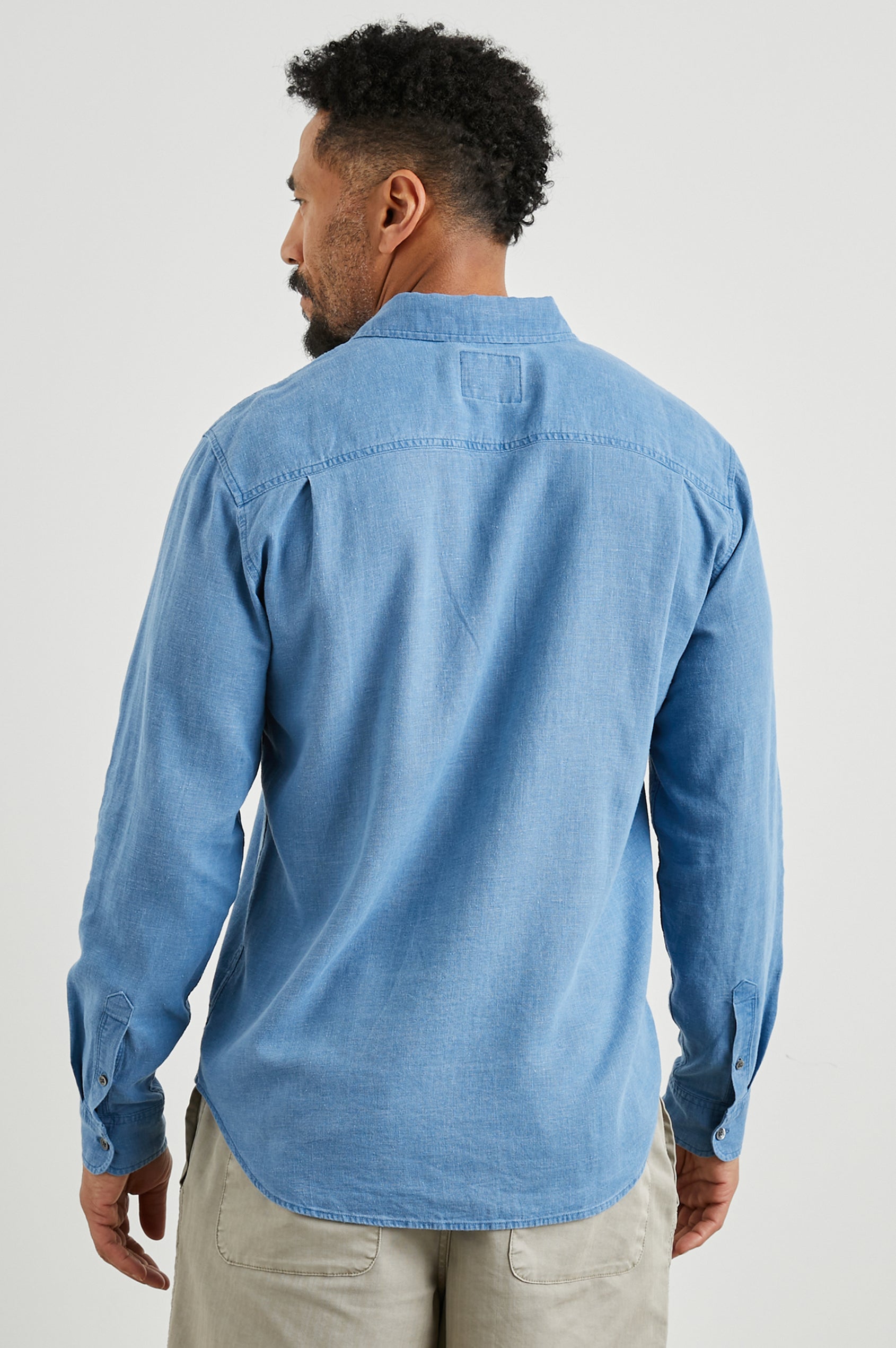 Mykonos Long-Sleeve Button Up with a Patch Pocket in Celsius Colorway, a blue - Back View Featured on Model