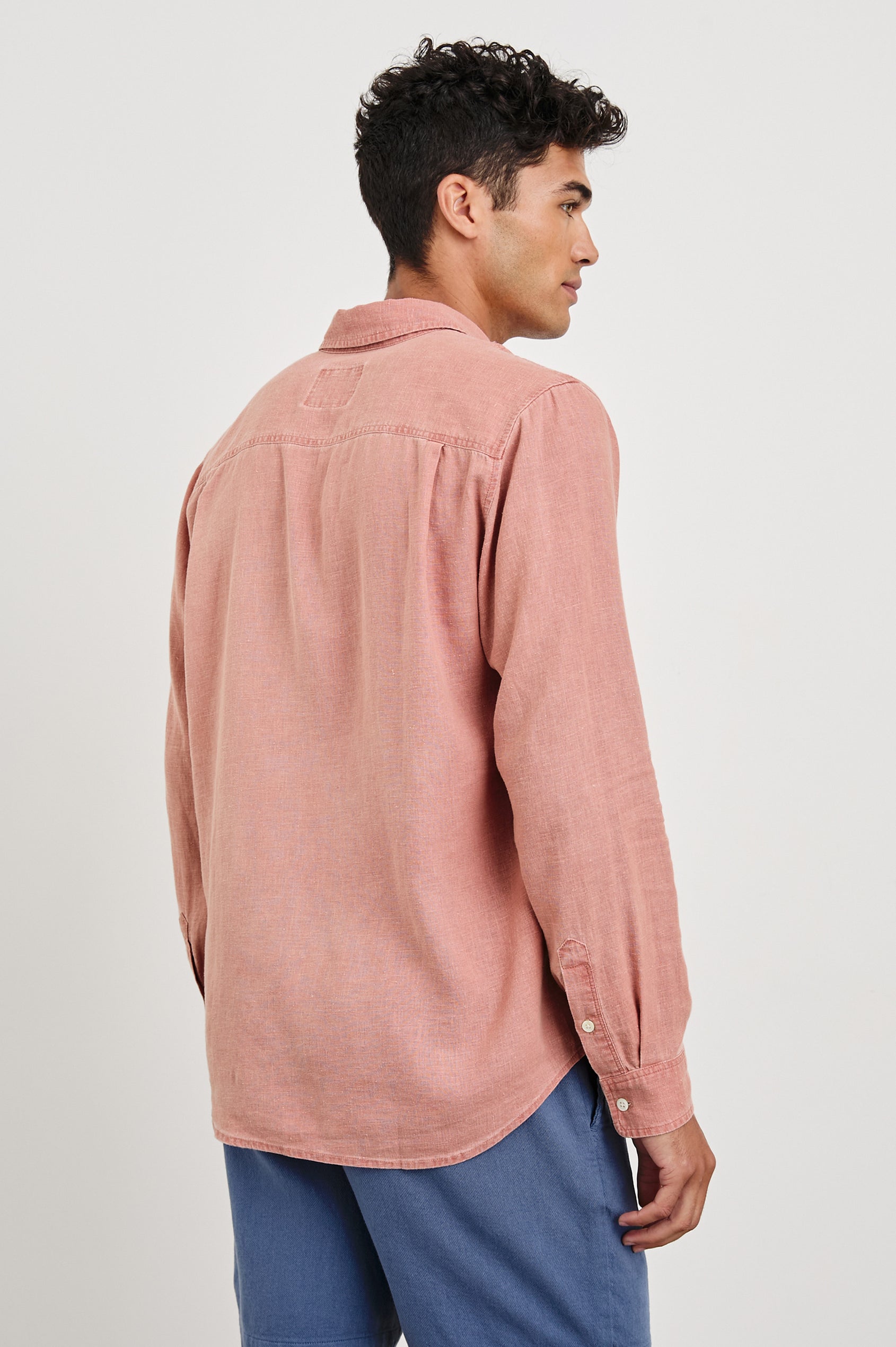 Mykonos linen button up long sleeve with front chest pocket and collar in Desert Rose - back view on model