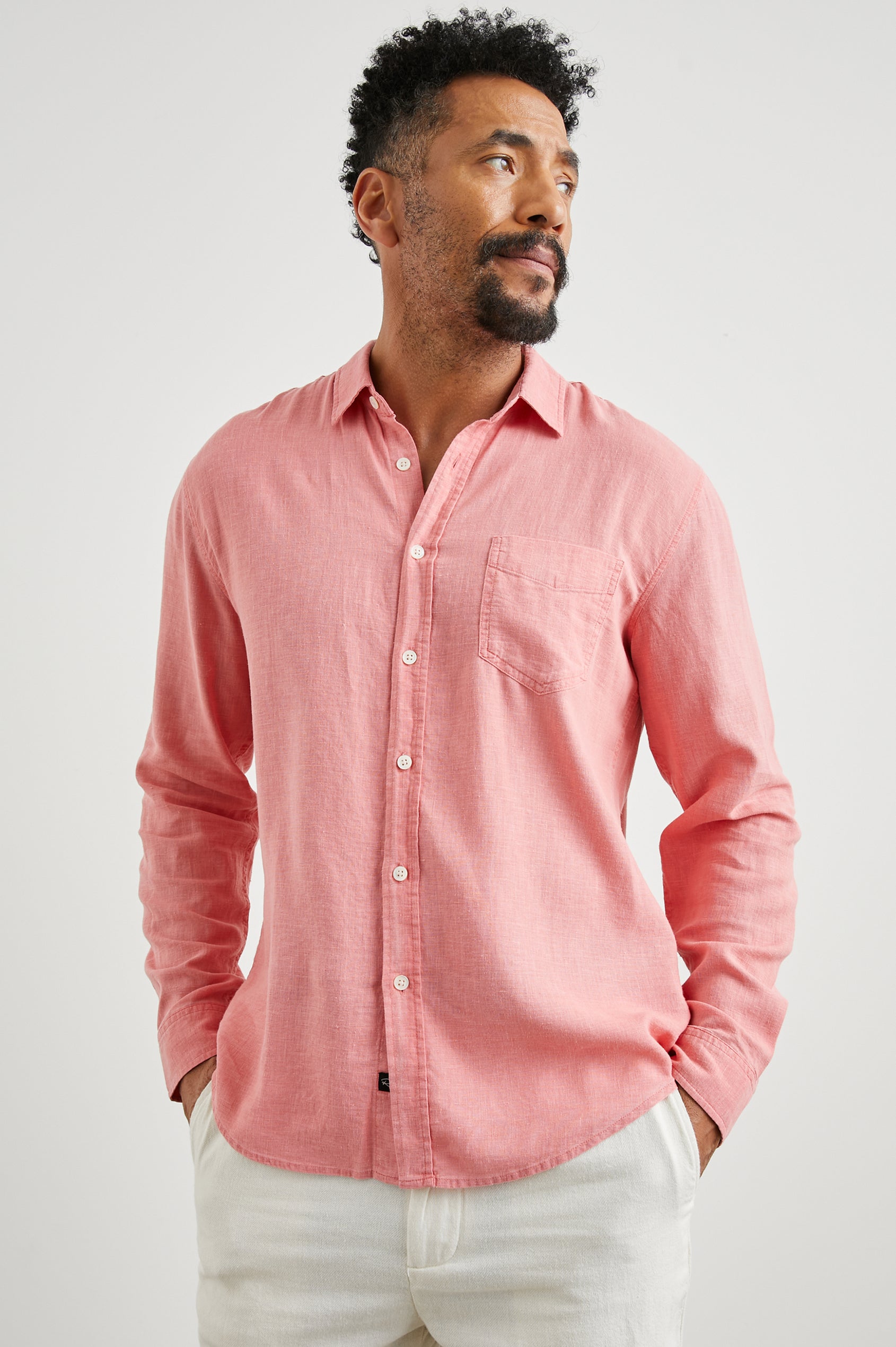 Mykonos Long-Sleeve Button Up with a Patch Pocket in Equator Colorway, a pink - Front View Featured on Model