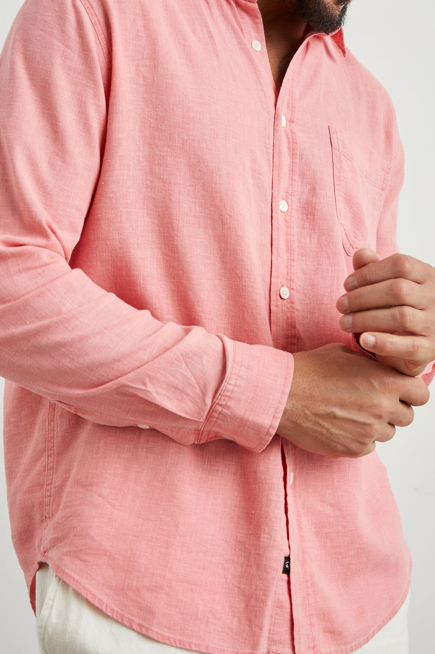 Mykonos Long-Sleeve Button Up with a Patch Pocket in Equator Colorway, a pink - Front View Featured on Model