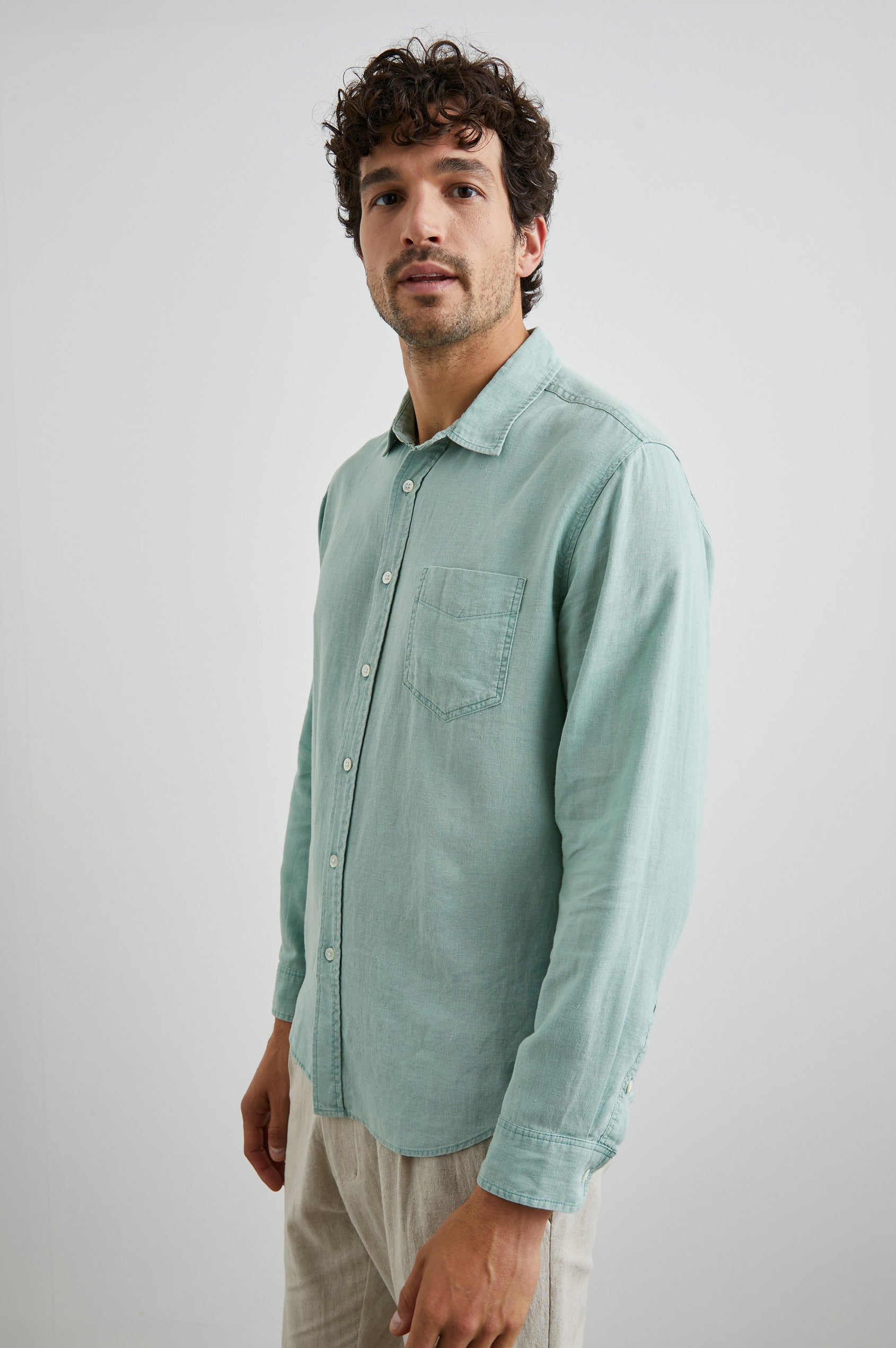 Mykonos Long-Sleeve Button Up with a Patch Pocket in Jade Colorway - Side View Featured on Model