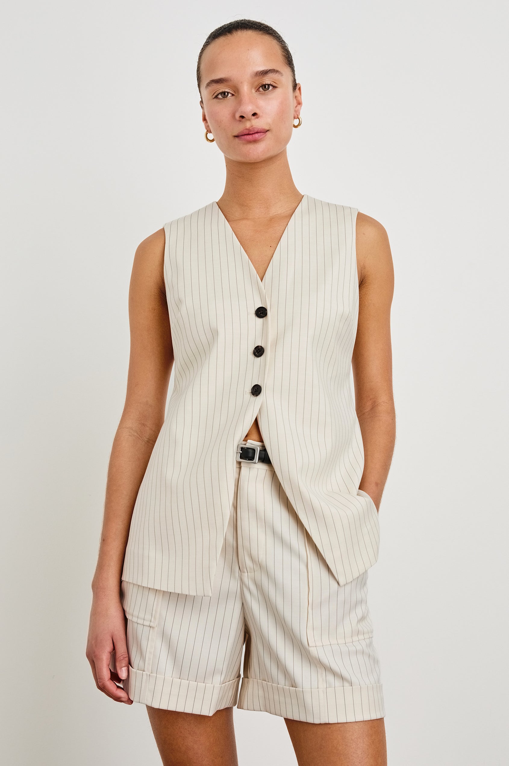 Mylah longline tan vest with black buttons in Birch Pinstripe - front view on model with matching shorts