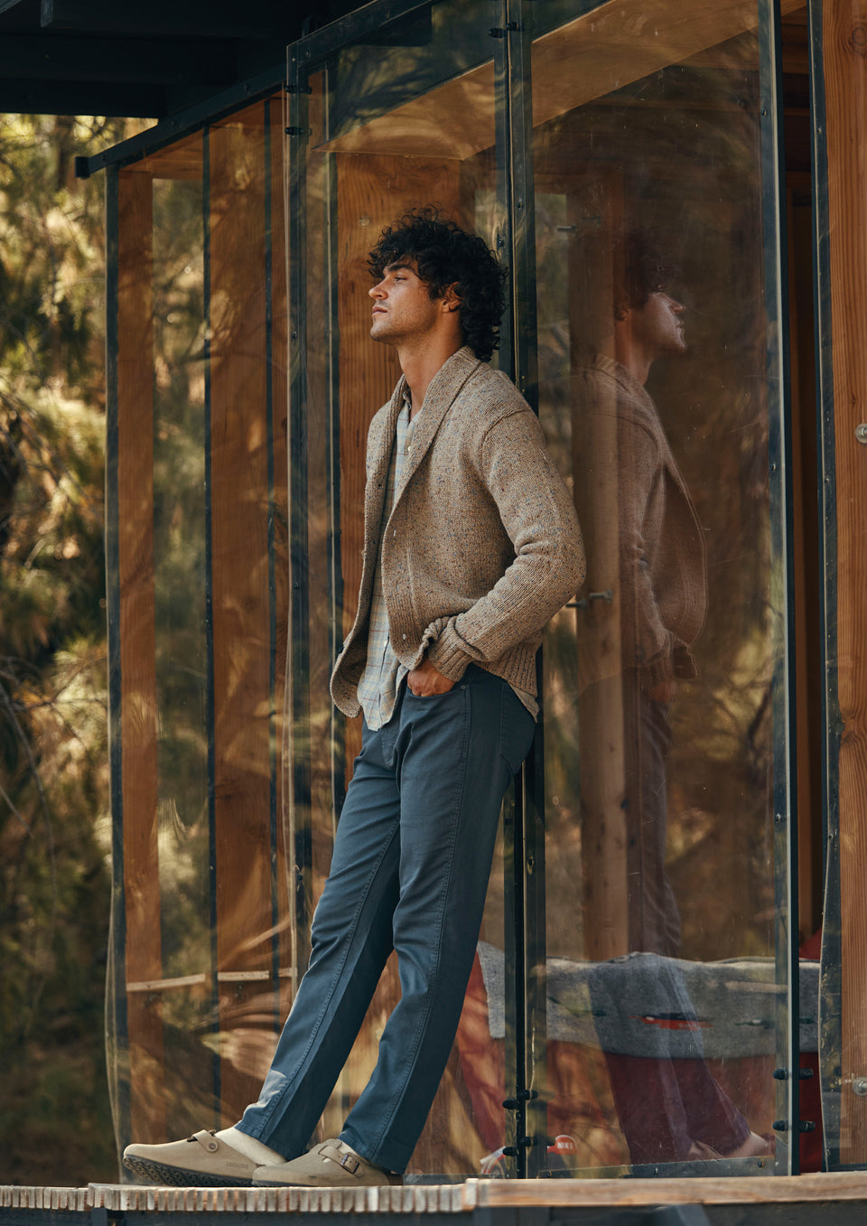 SIDE EDITORIAL IMAGE OF MODEL WEARING CORDEN CARDIGAN CARVER PANT