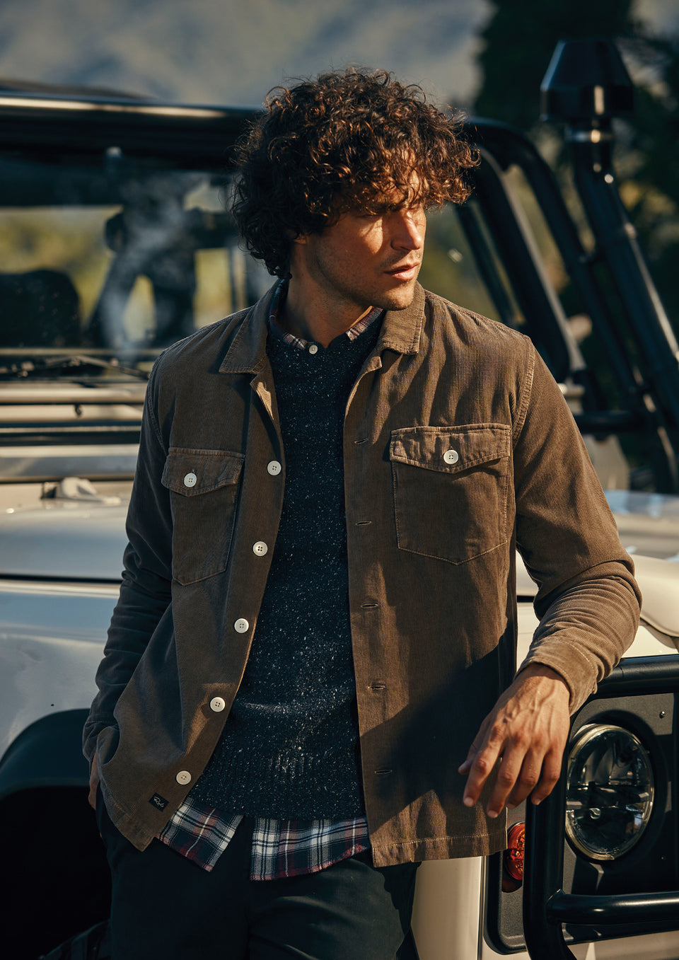 FRONT EDITORIAL IMAGE OF MODEL WEARING KEROUAC SHIRT JACKET AND DONOVAN SWEATER