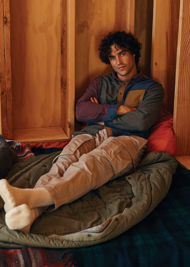 EDITORIAL IMAGE OF MODEL SITTING WEARING RUNSON SHIRT