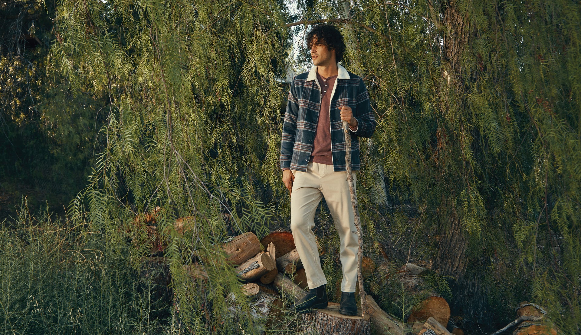 FRONT EDITORIAL IMAGE OF MODEL WEARING OZARK JAKCET AND SKHI HENLEY