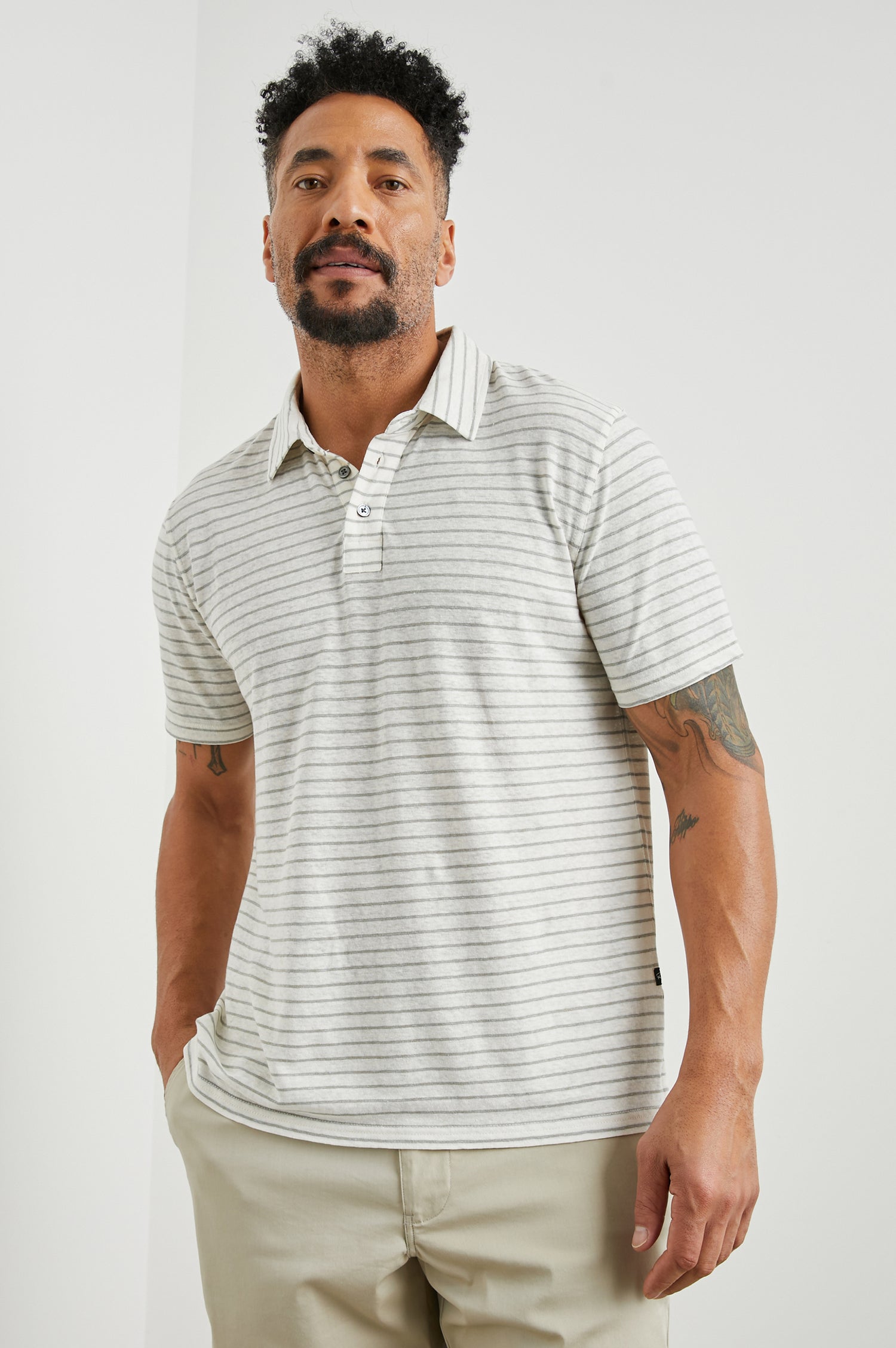 Napoli Short Sleeve Polo Shirt with a Three-Button Placket in Cream Barley Stripe Colorway, Horizontal Stripes - Front View Featured on Model
