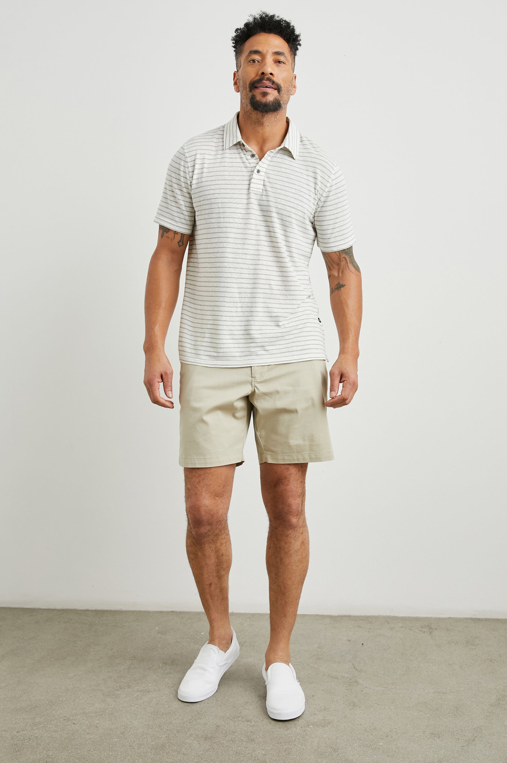 Napoli Short Sleeve Polo Shirt with a Three-Button Placket in Cream Barley Stripe Colorway, Horizontal Stripes - Front Full Body View Featured on Model
