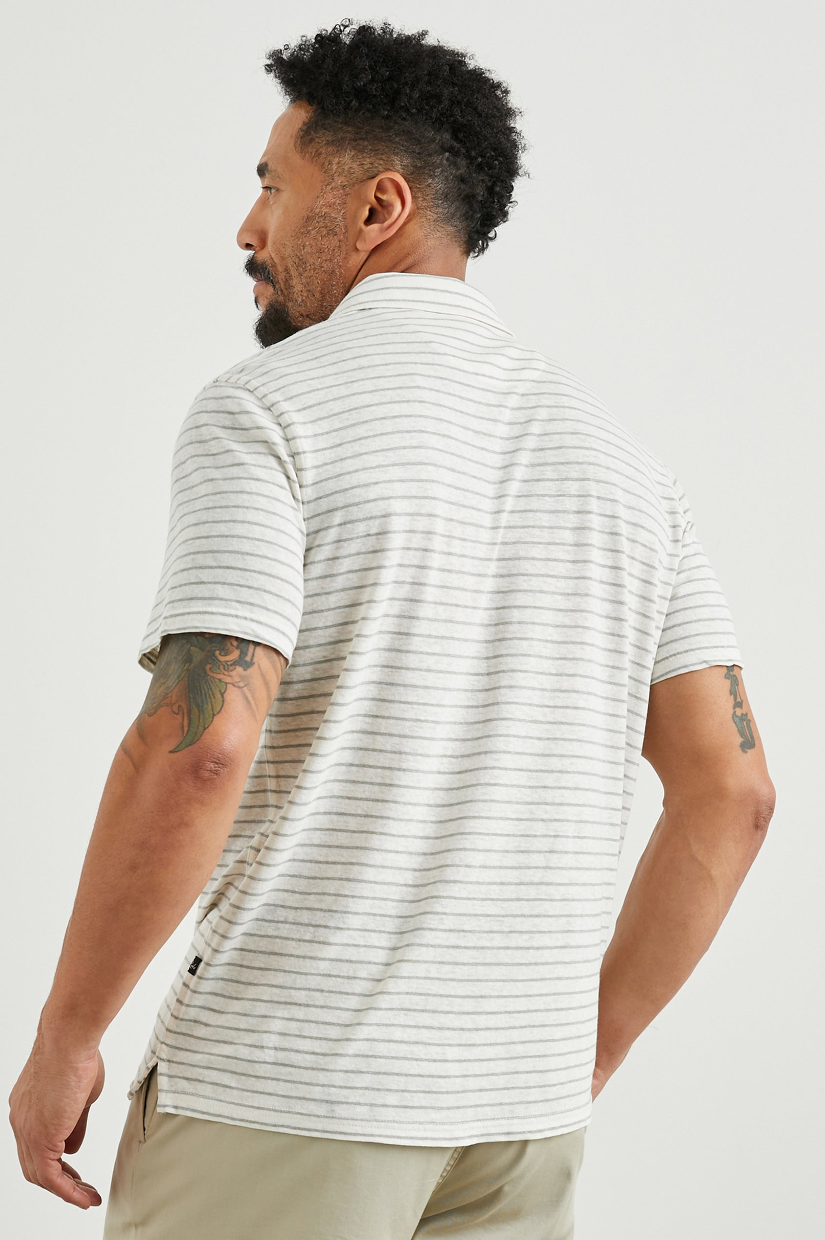 Napoli Short Sleeve Polo Shirt with a Three-Button Placket in Cream Barley Stripe Colorway, Horizontal Stripes - Back View Featured on Model
