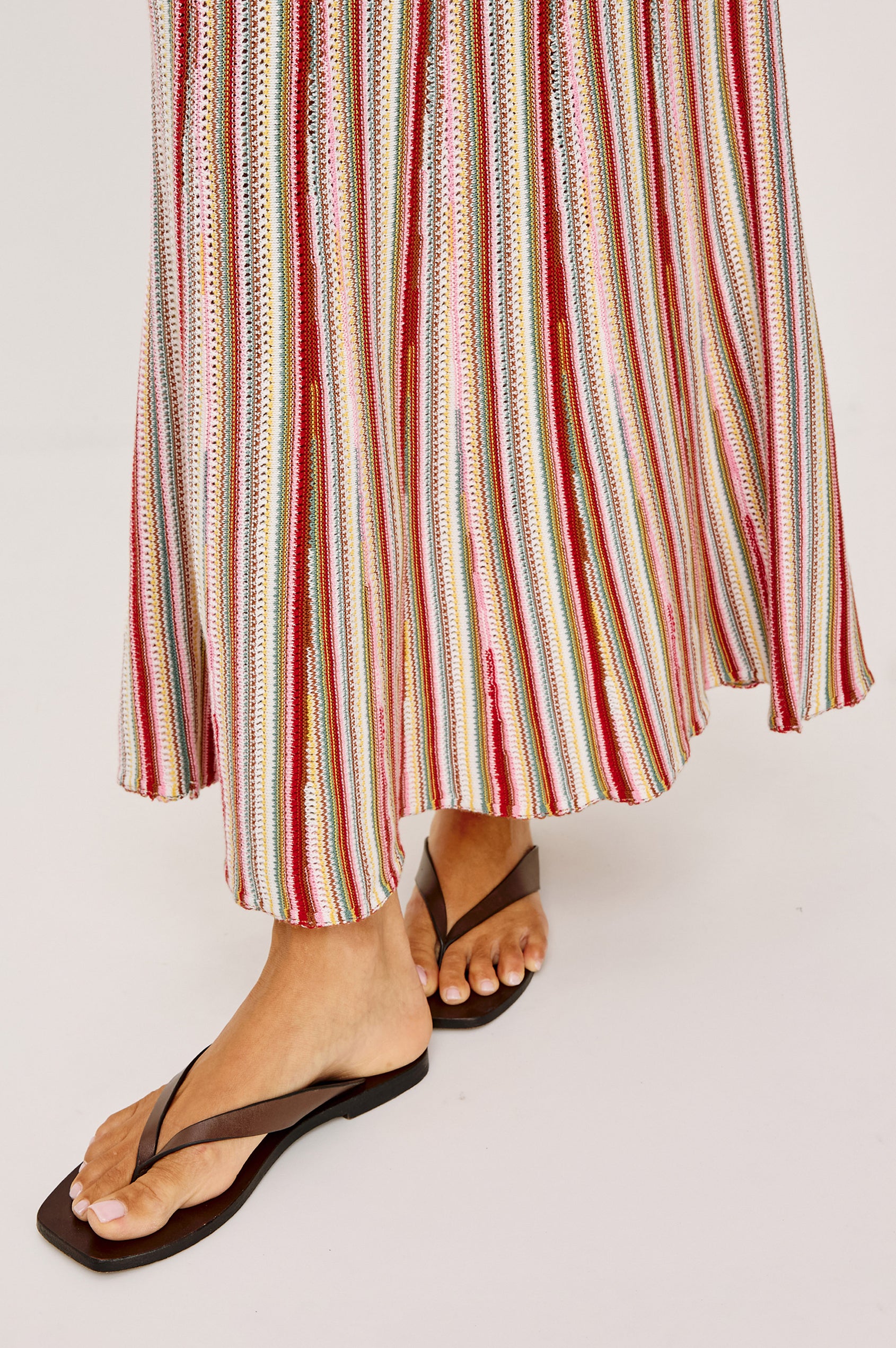 Nari Maxi Skirt in Cotton Knit With High-Rise Stretch Waistband and Trumpet Silhouette in Havana Stripe - Front Hem View Featured on Model