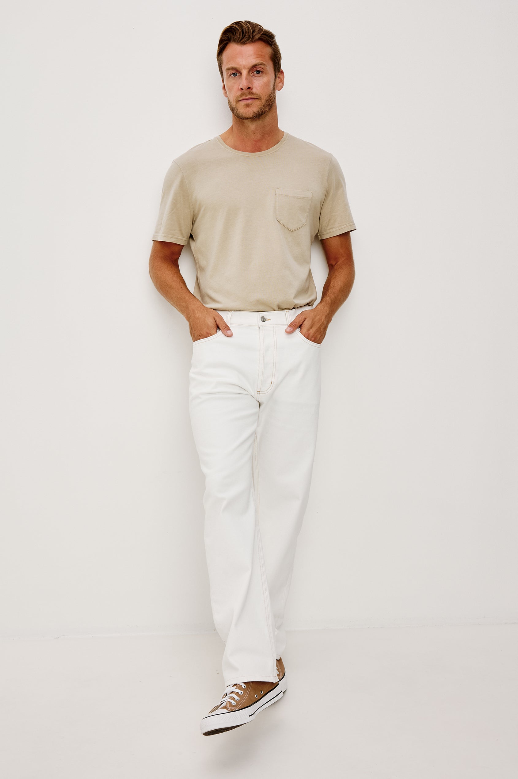 Nash Straight Leg Jean in Stretch Cotton With Classic 5-Pockets, Belt Loops, and a Front Zip Fly in Ecru Colorway - Full Body Front View Featured on Model