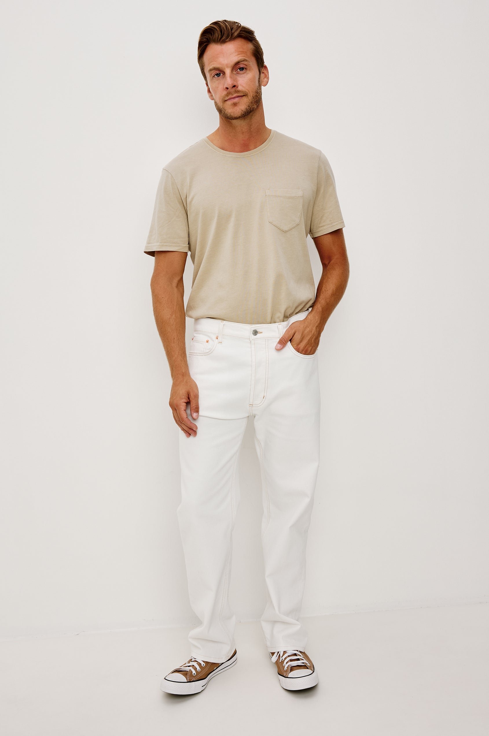 Nash Straight Leg Jean in Stretch Cotton With Classic 5-Pockets, Belt Loops, and a Front Zip Fly in Ecru Colorway - Full Body Front View Featured on Model
