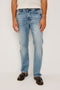Nash is a straight leg 5-Pocket denim jean a zip fly and button closure as well as rivets in a Medium Vintage Wash. Front view featured on model.