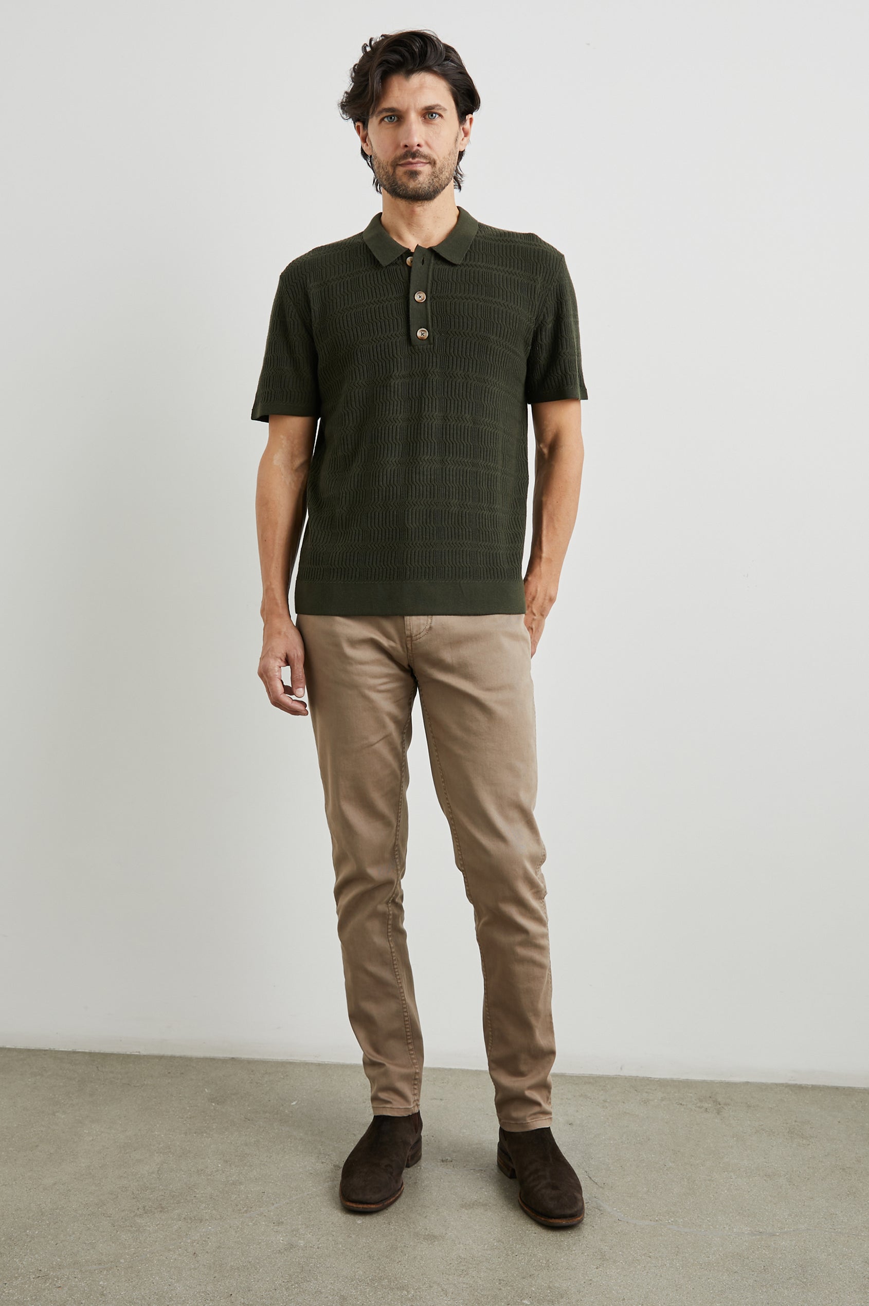 Nathan Short-Sleeve Polo Shirt with a Three-Button Placket and a Jacquard Pattern in Ancient Olive Colorway - Front Full Body View Featured on Model