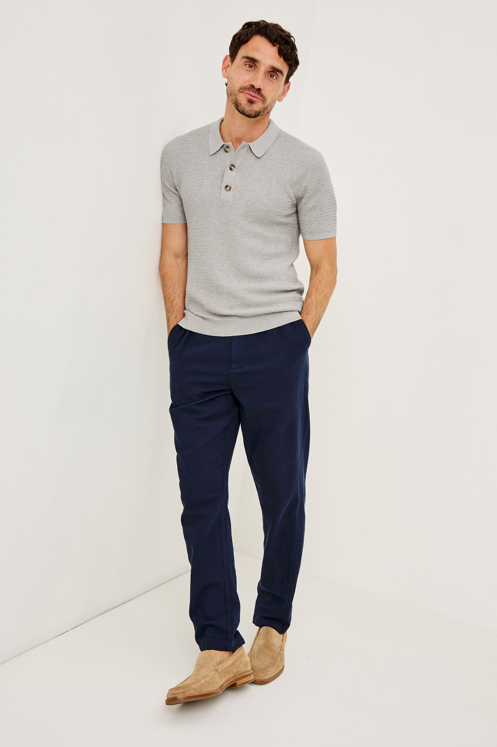 Nathan Polo Shirt in Cotton Blend Knit With Collar, Quarter Button Placket, and Short Sleeves in Heather Grey Colorway - Full Body Front View Featured on Model