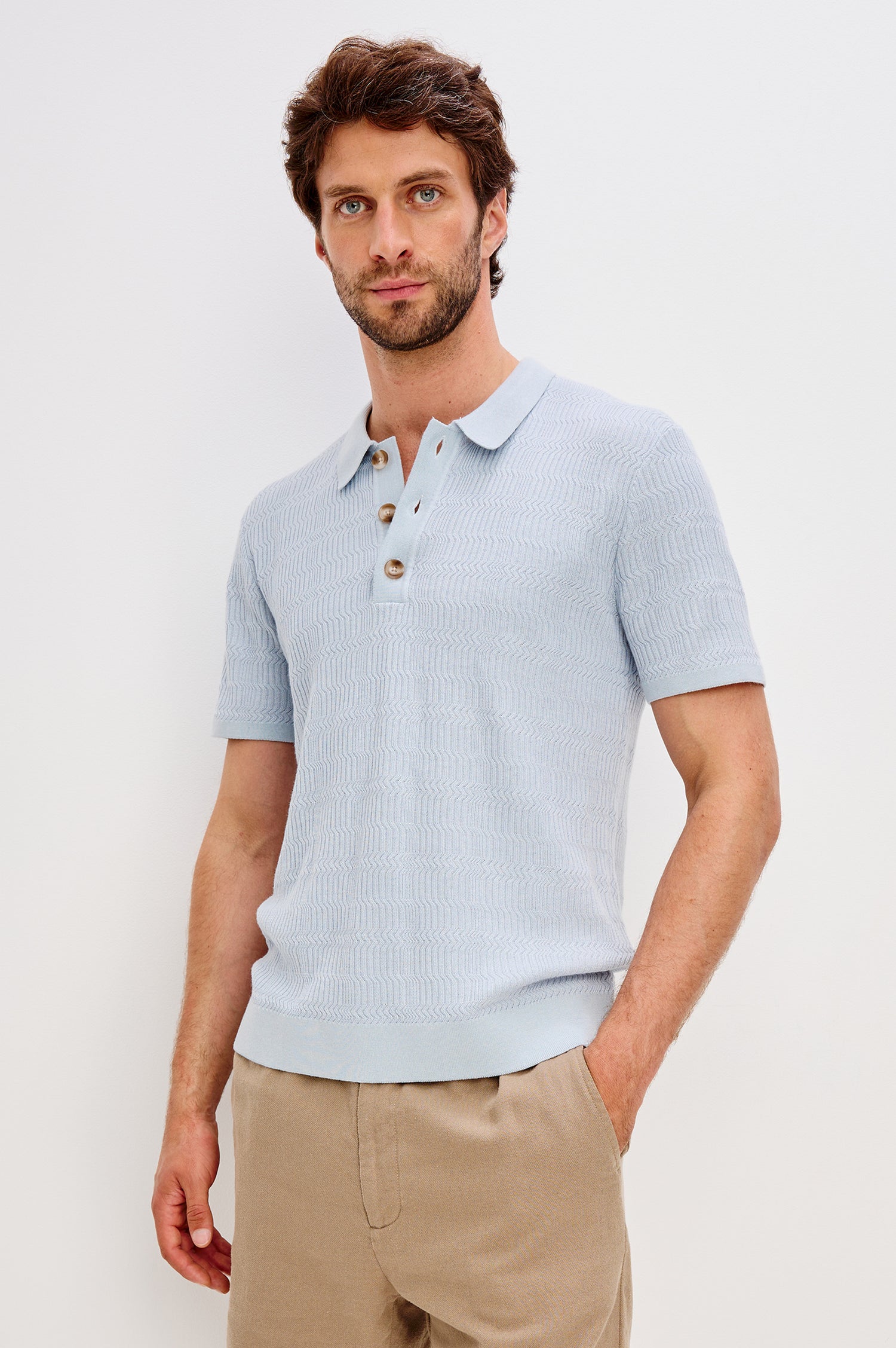 Nathan Short-Sleeve Polo Shirt with a Three-Button Placket and a Jacquard Pattern in Skyway Colorway - Front View Featured on Model