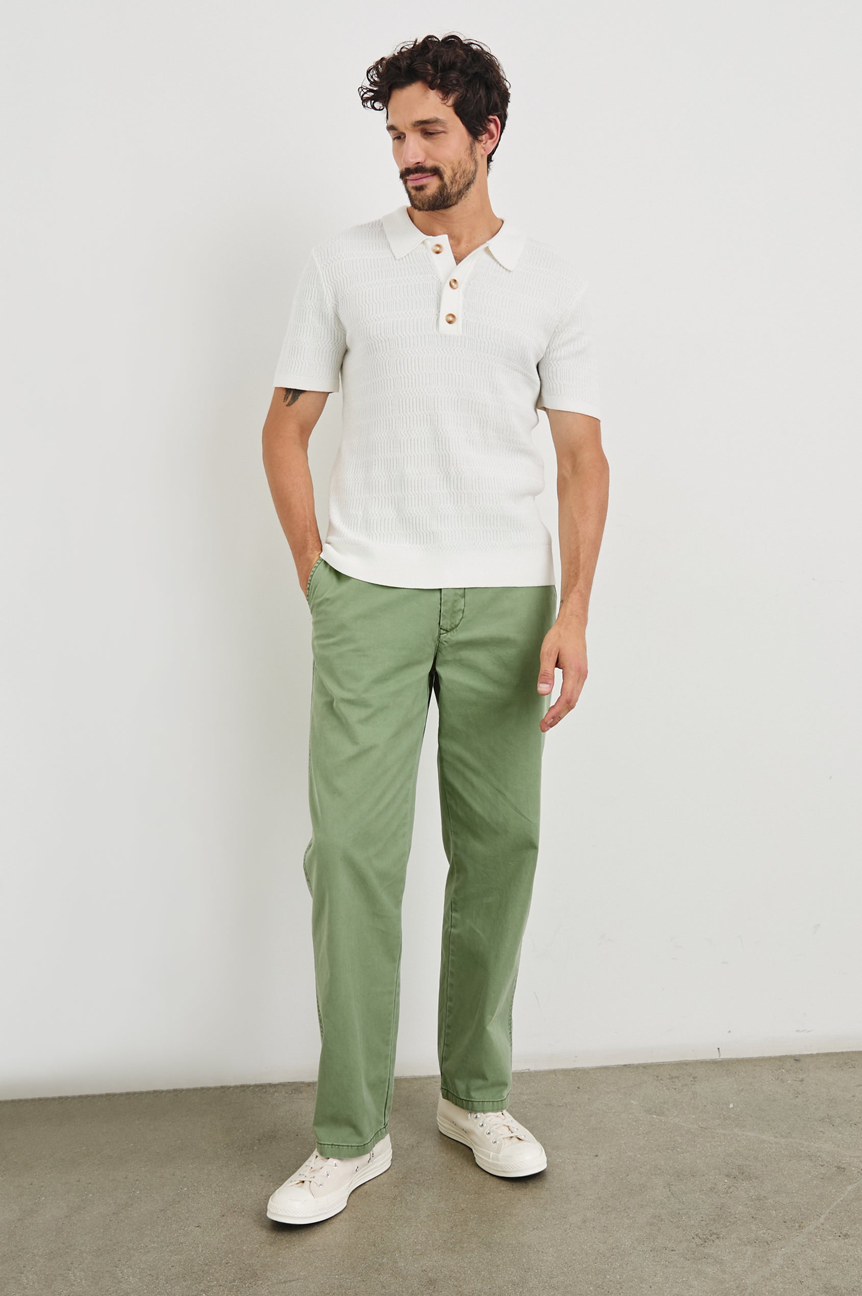 Nathan Short-Sleeve Polo Shirt with a Three-Button Placket and a Jacquard Pattern in White Colorway - Front Full Body View Featured on Model