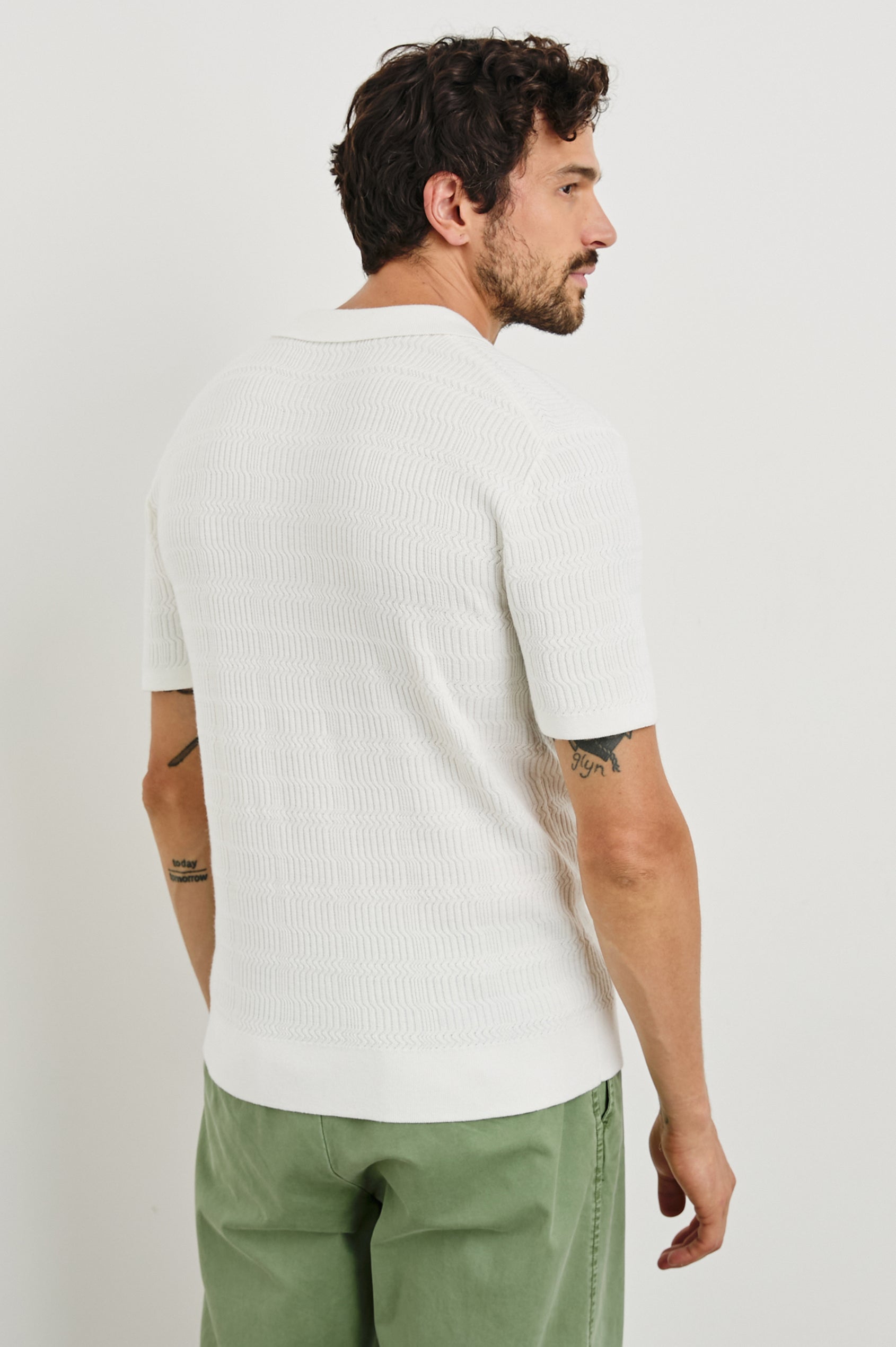 Nathan Short-Sleeve Polo Shirt with a Three-Button Placket and a Jacquard Pattern in White Colorway - Back View Featured on Model