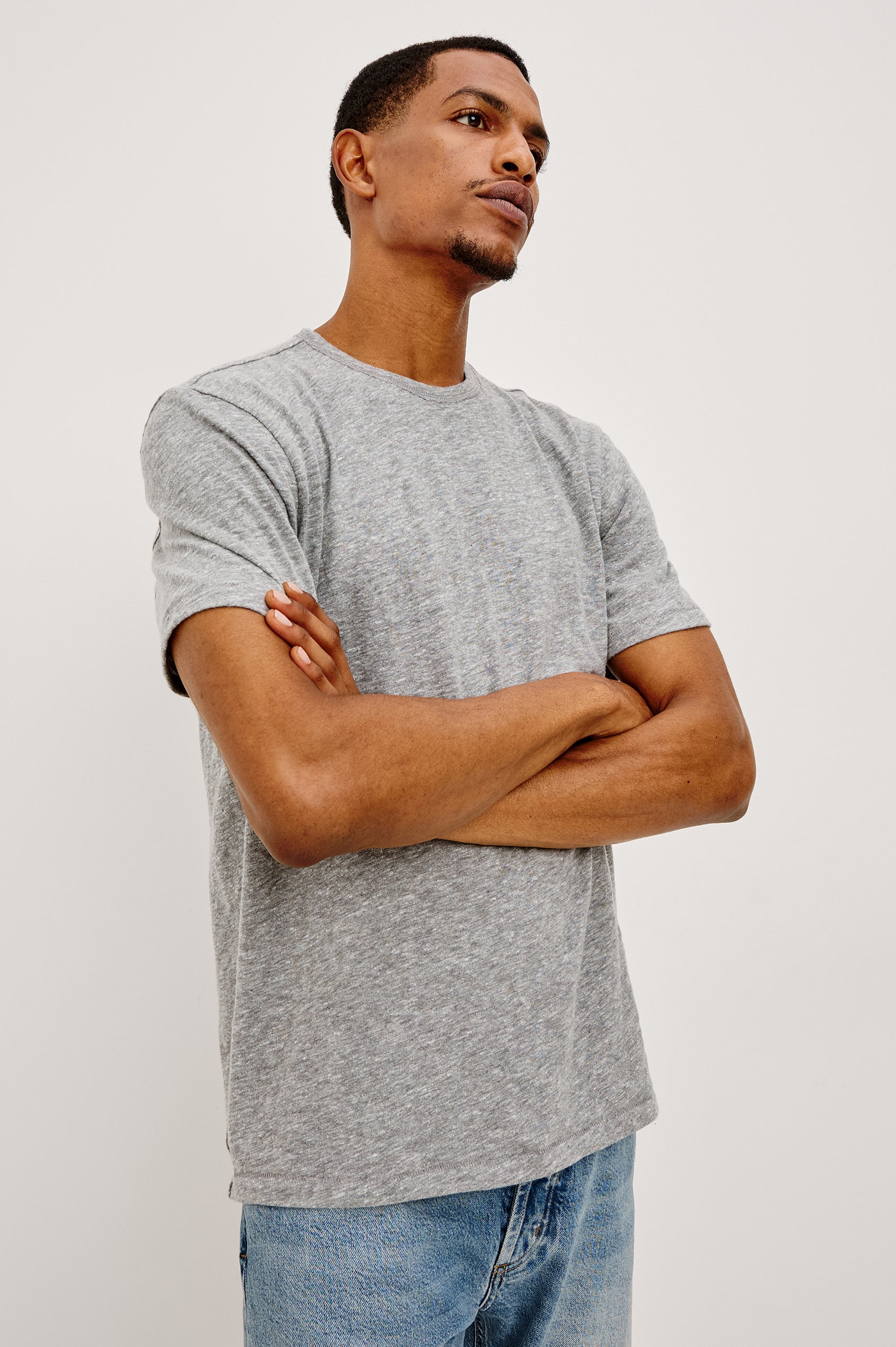 Neil Tee in Slub Cotton Jersey With Classic Fit, Short Sleeves, and Crewneck in Heather Grey Colorway - Upper Body Front View Featured on Model