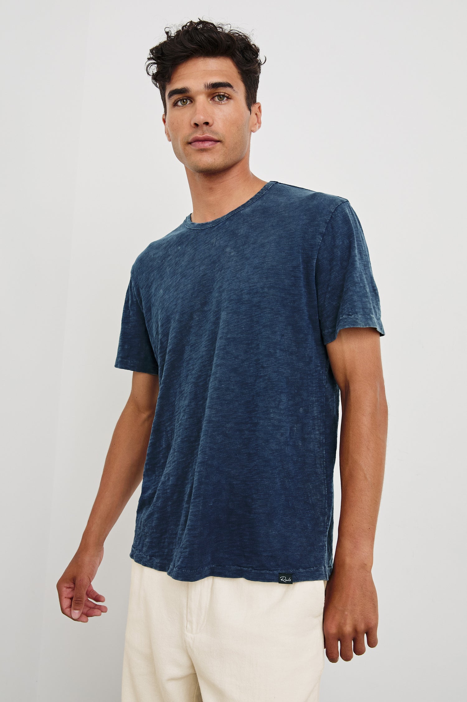 Neil cotton jersey crewneck t-shirt in Vintage Indigo - front view on model