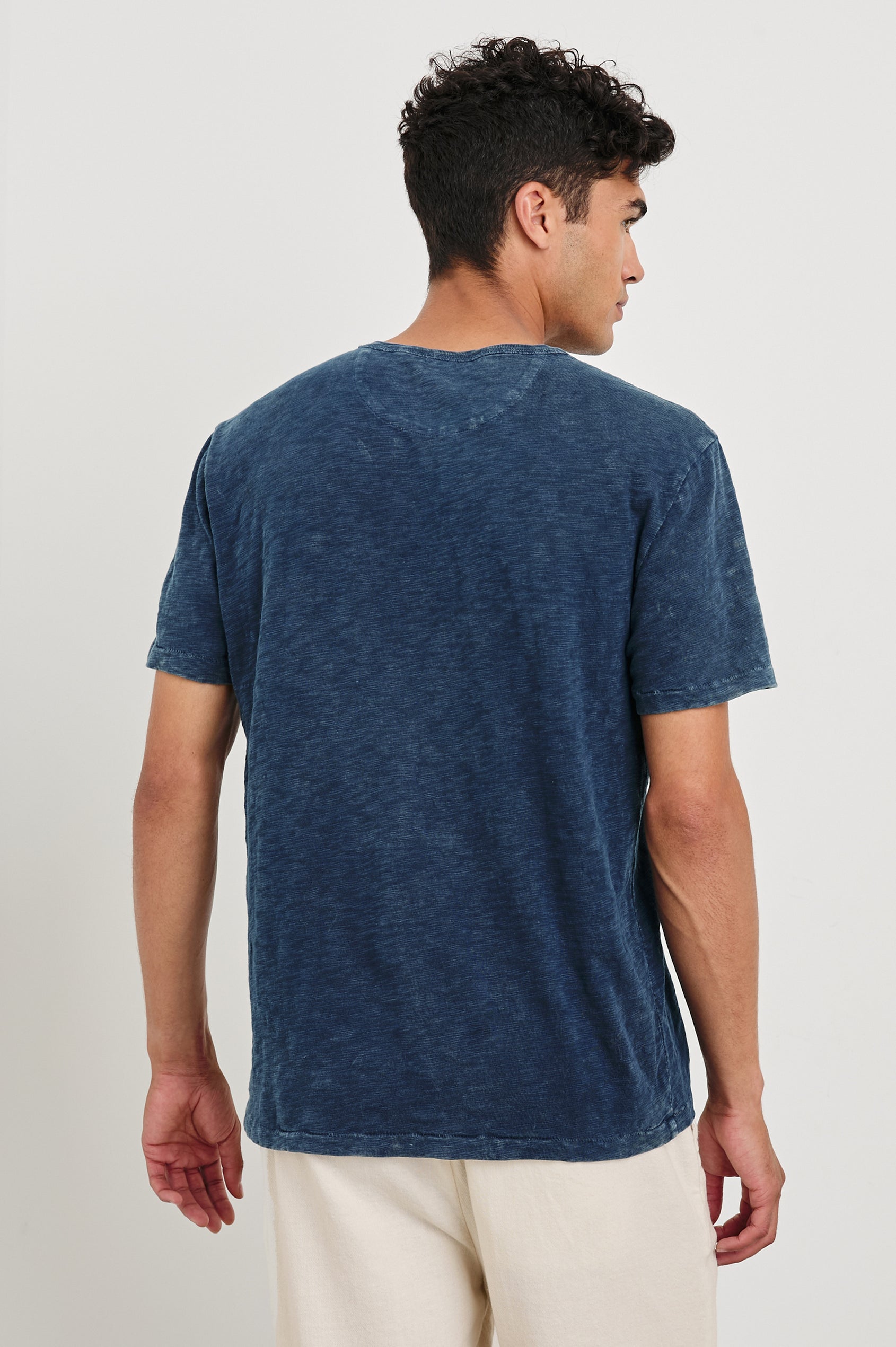 Neil cotton jersey crewneck t-shirt in Vintage Indigo - back view on model