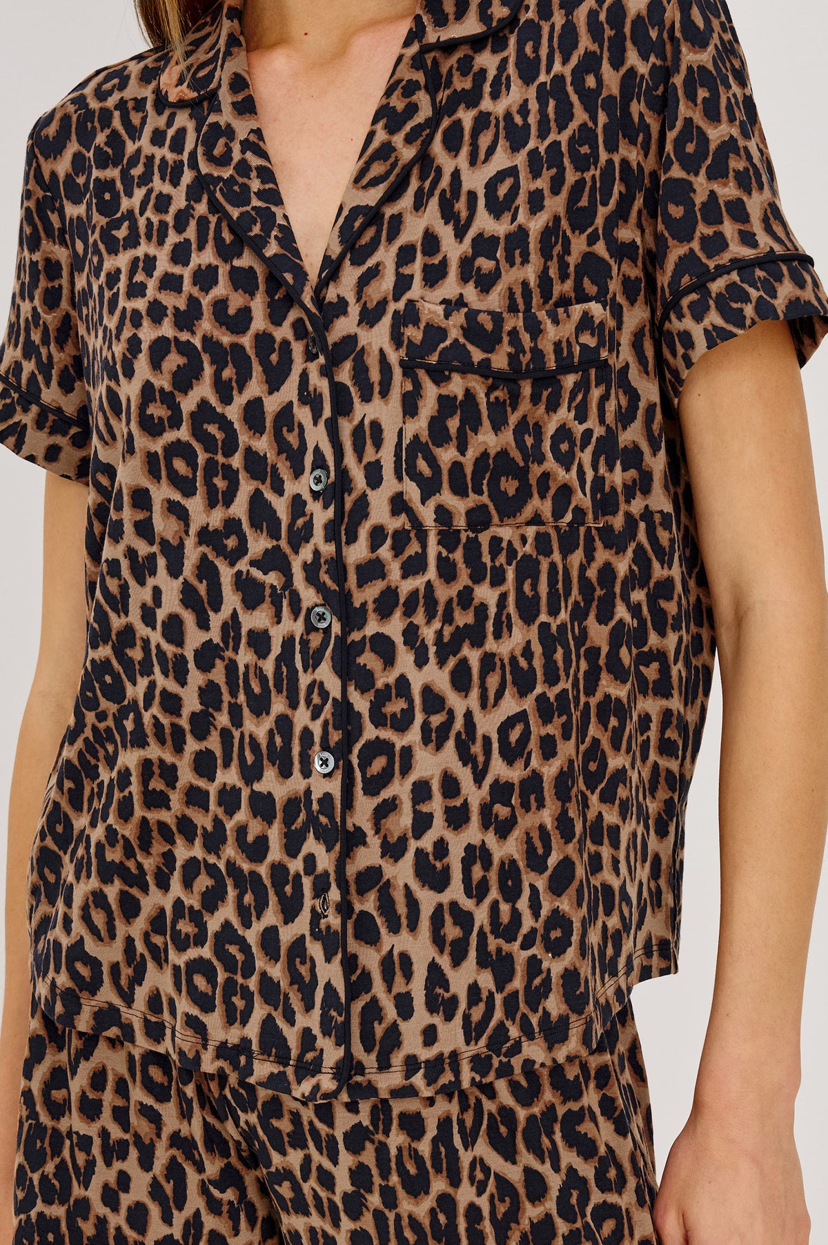 Nessa Pajama Set in Signature Rayon With Relaxed Long-Sleeve Button-Up Shirt WIth Collar, Piping Throughout, and HIgh-Rise Shorts With Elastic Waistband in Brown Nala Colorway - Upper Body Front View Featured on Model