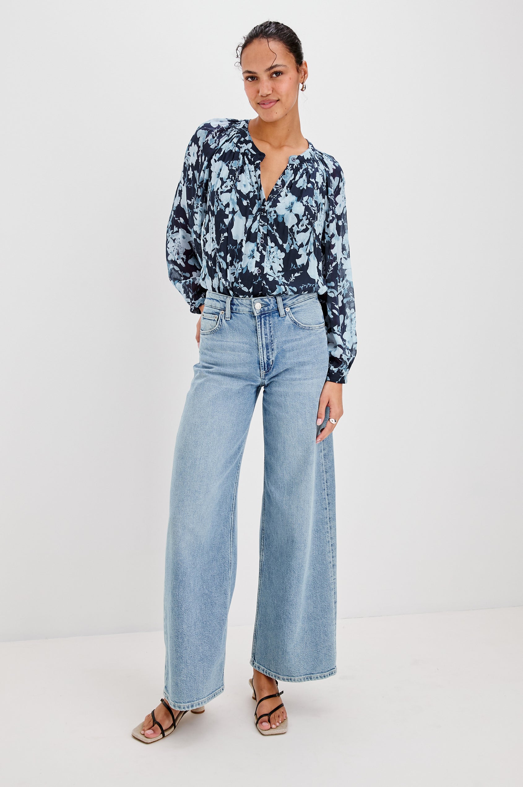 Nessie Long Sleeve Top with Front Button Closure and Ruching along the Neckline in Indigo Blossoms Colorway, Flowers in Blue on Indigo - Front Full Body View Featured on Model 