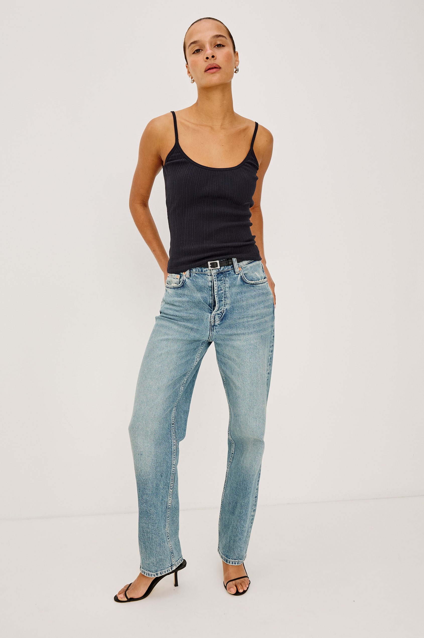 Nila Scoop Neck Fitted Tank Top With Ribbed Texture in Black Colorway - Upper Body Front View Featured on Model