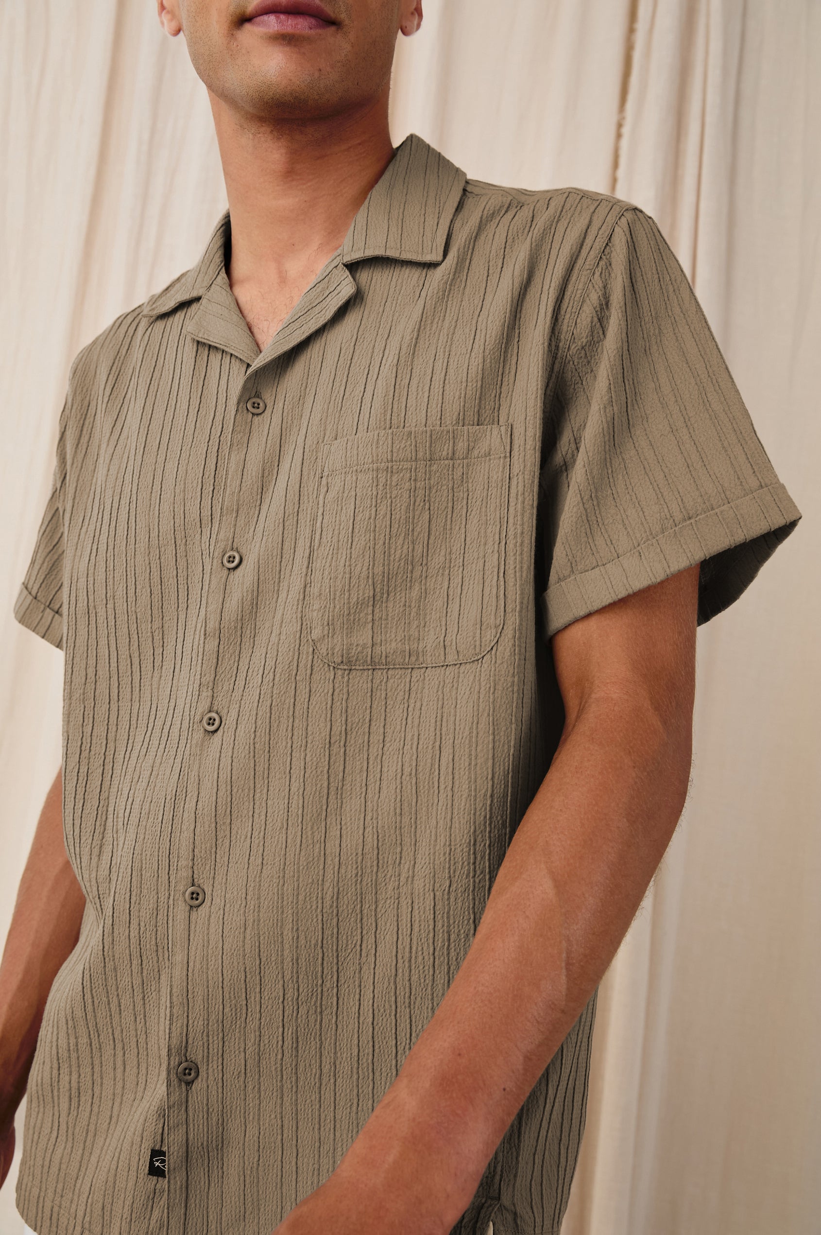 Ohana textured button up short sleeve shirt with collar and front chest pocket in Olive - close up of details