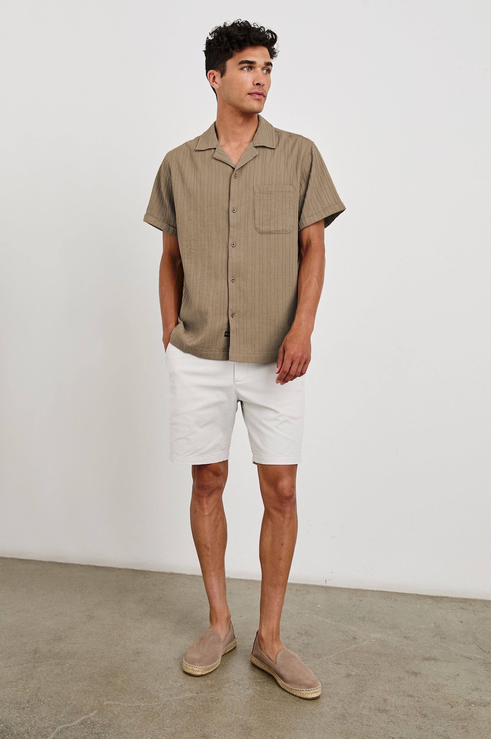 Ohana textured button up short sleeve shirt with collar and front chest pocket in Olive - full body front view on model