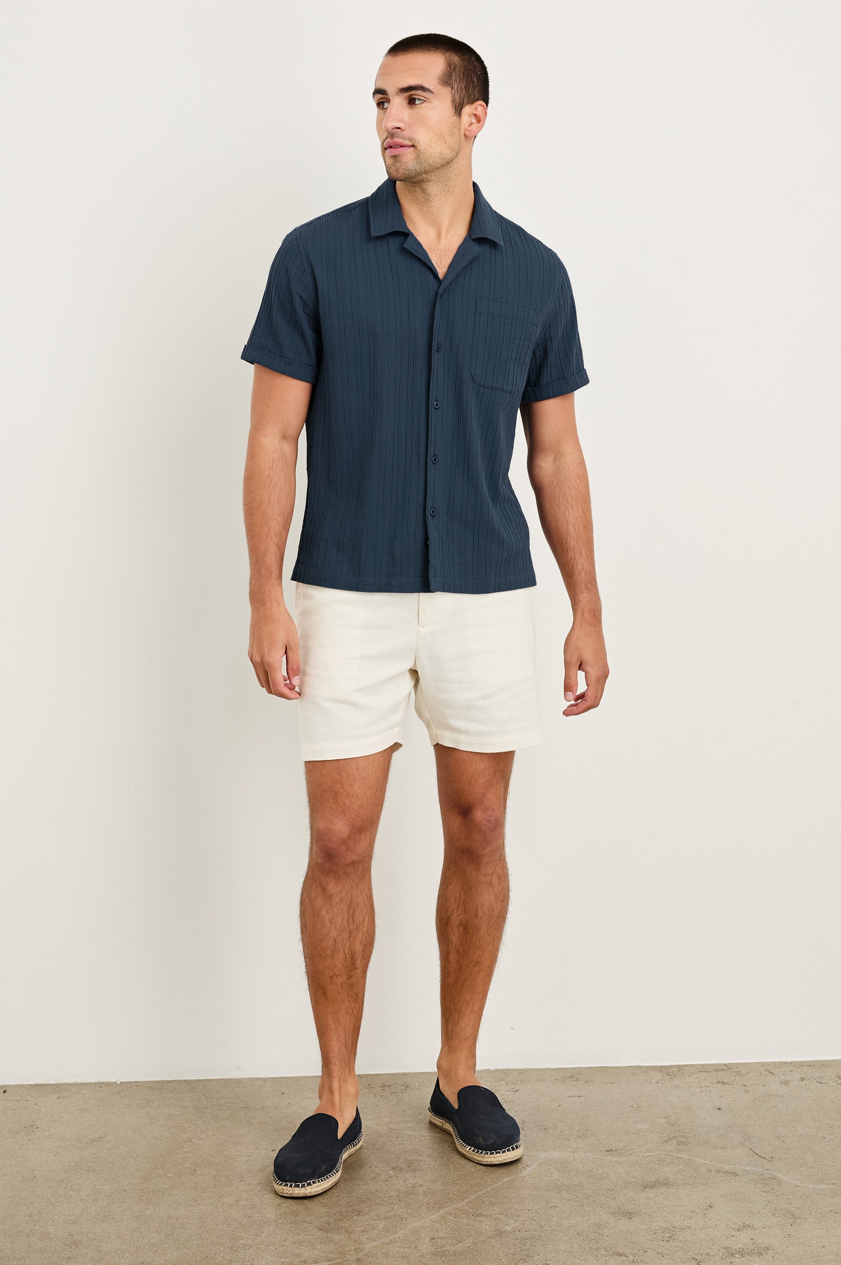 Ohana textured button up short sleeve shirt with collar and front chest pocket in Sea Blue - full body front view on model