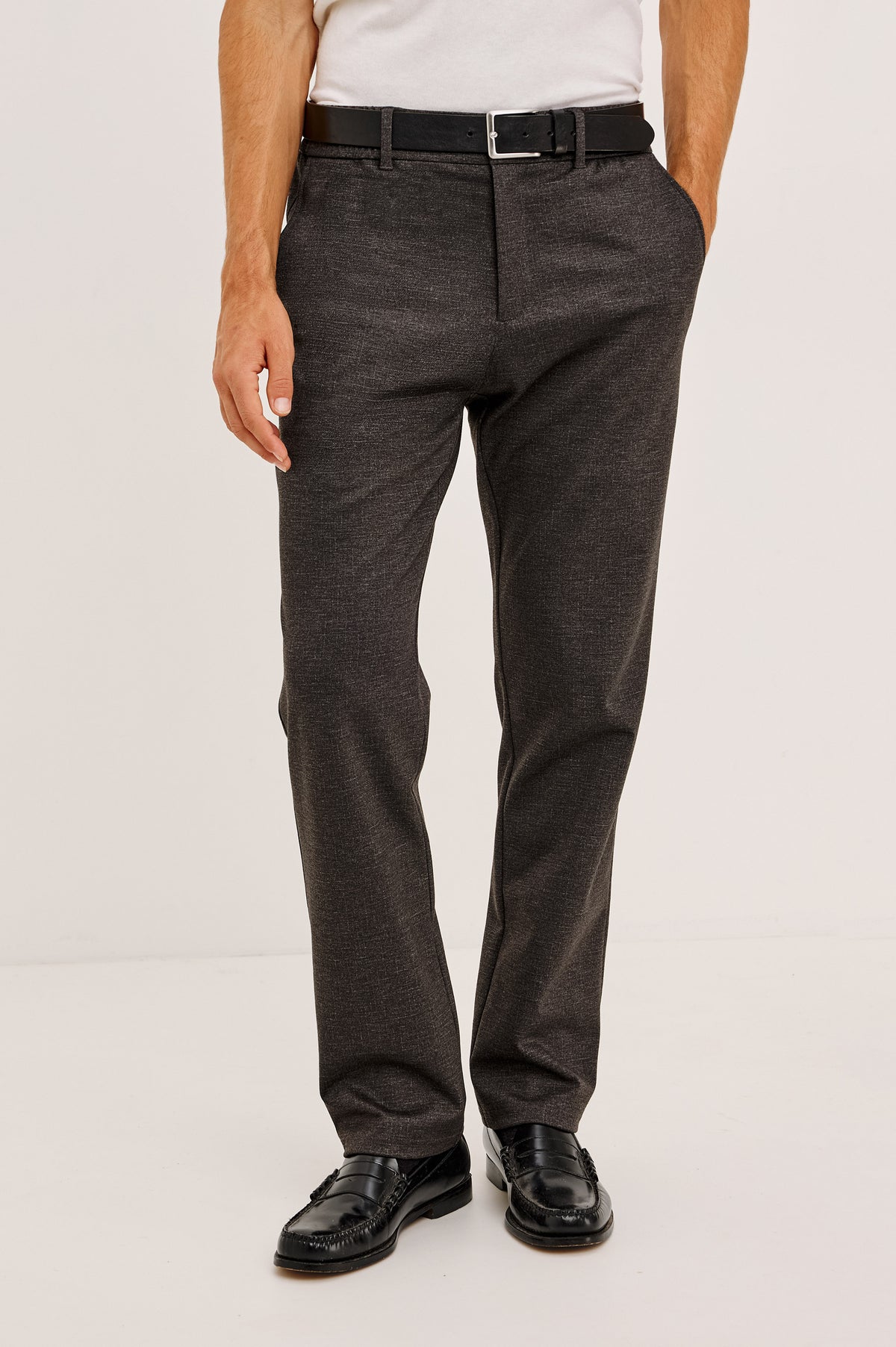 Olivier Pant in Stretch Ponte Knit With Slim Legs, Clean Front Waistband With Belt Loops, Elasticated Sides and Back, Front Zip Fly, Side Slash Pockets, and Back Welt Pockets in Umber Colorway - Lower Body Front View Featured on Model