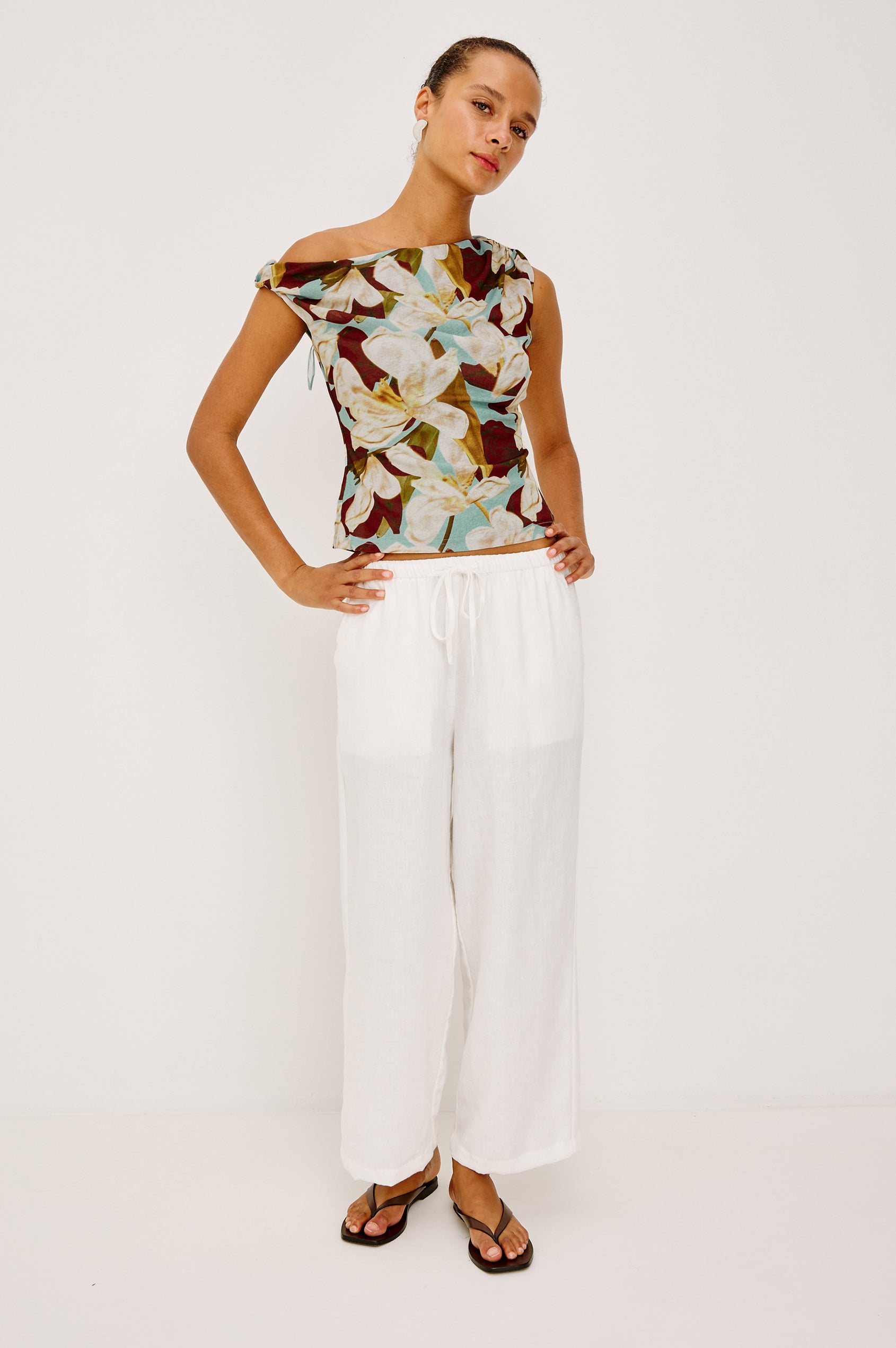 Orelia Fitted Top in Self-Lined Mesh With Twisted Shoulder Straps, and Asymmetrical One Shoulder Neckline in Plumeria Colorway - Full Body Front View Featured on Model