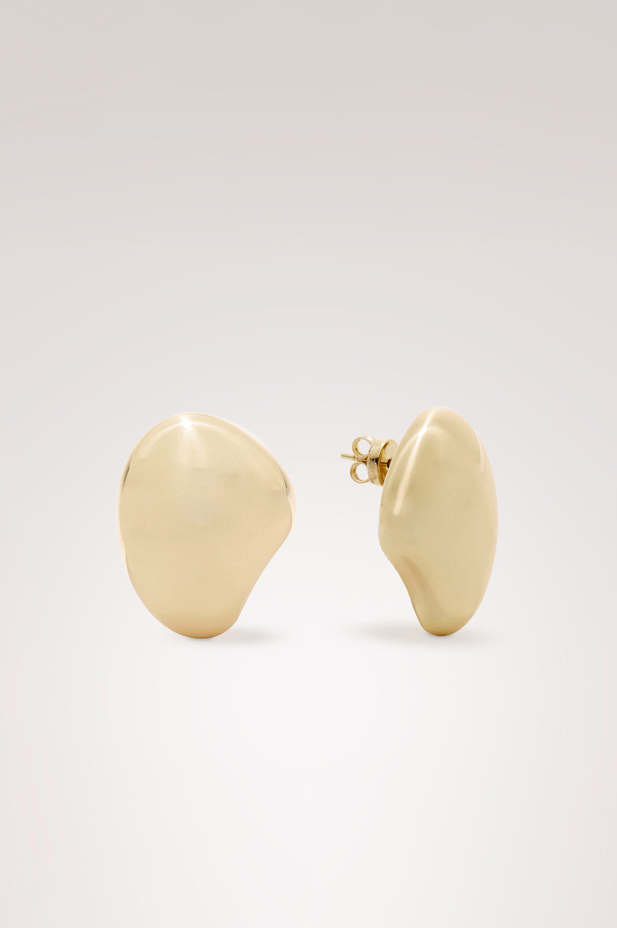 Organic Shaped Dome Earrings With Push Back Post Closure in Gold Colorway - Flat Lay Product View Featured